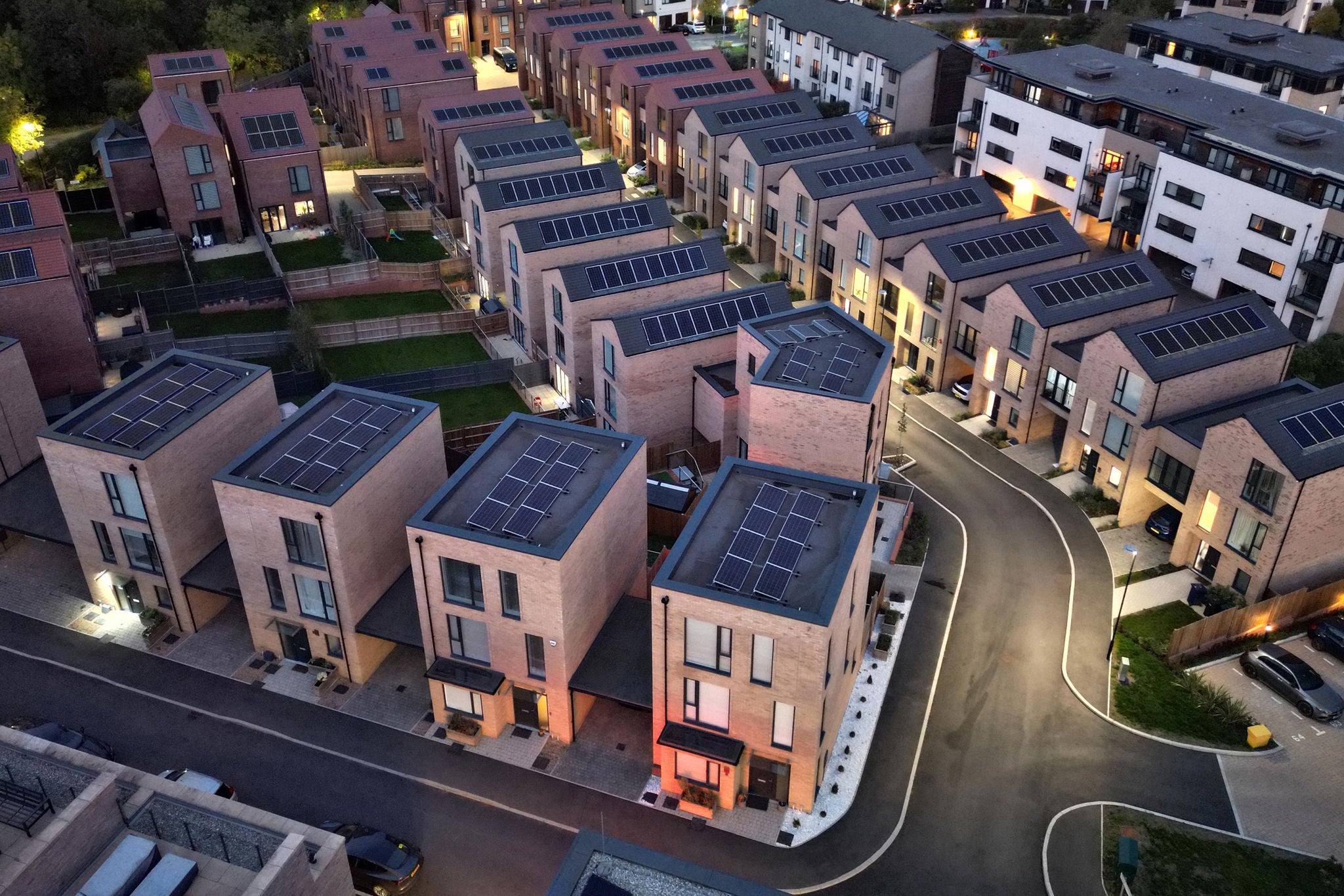 Sustainable residential community solar powered homes aerial view