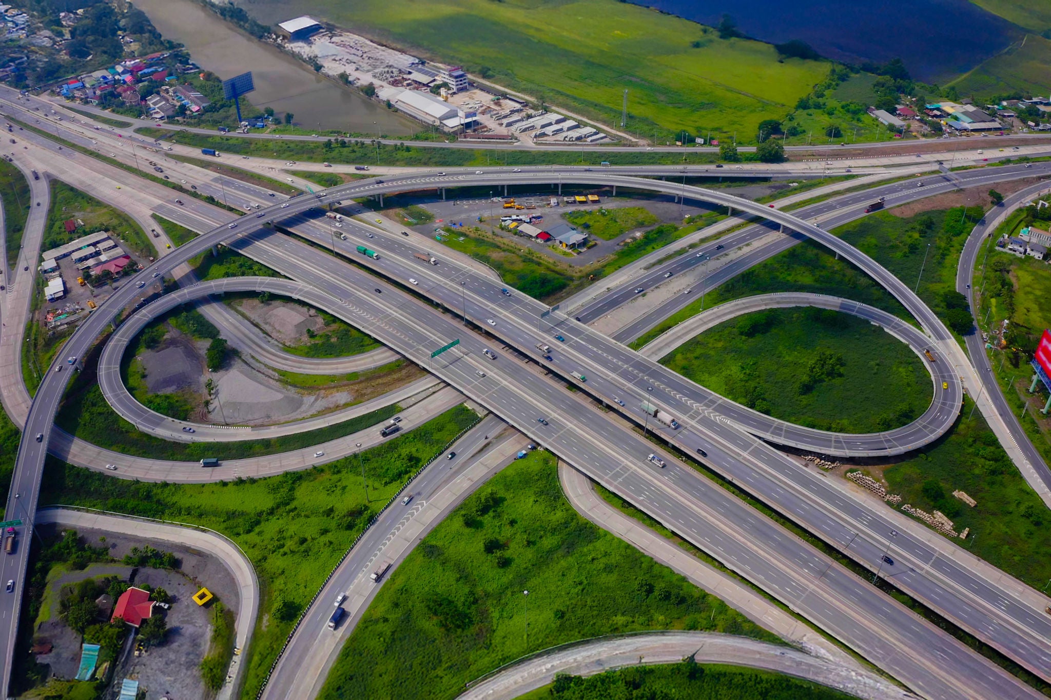 Bridge roads shape circle in structure of architecture and transportation concept. Top view. Urban city, Bangkok at sunset, Thailand. - 4K stock video