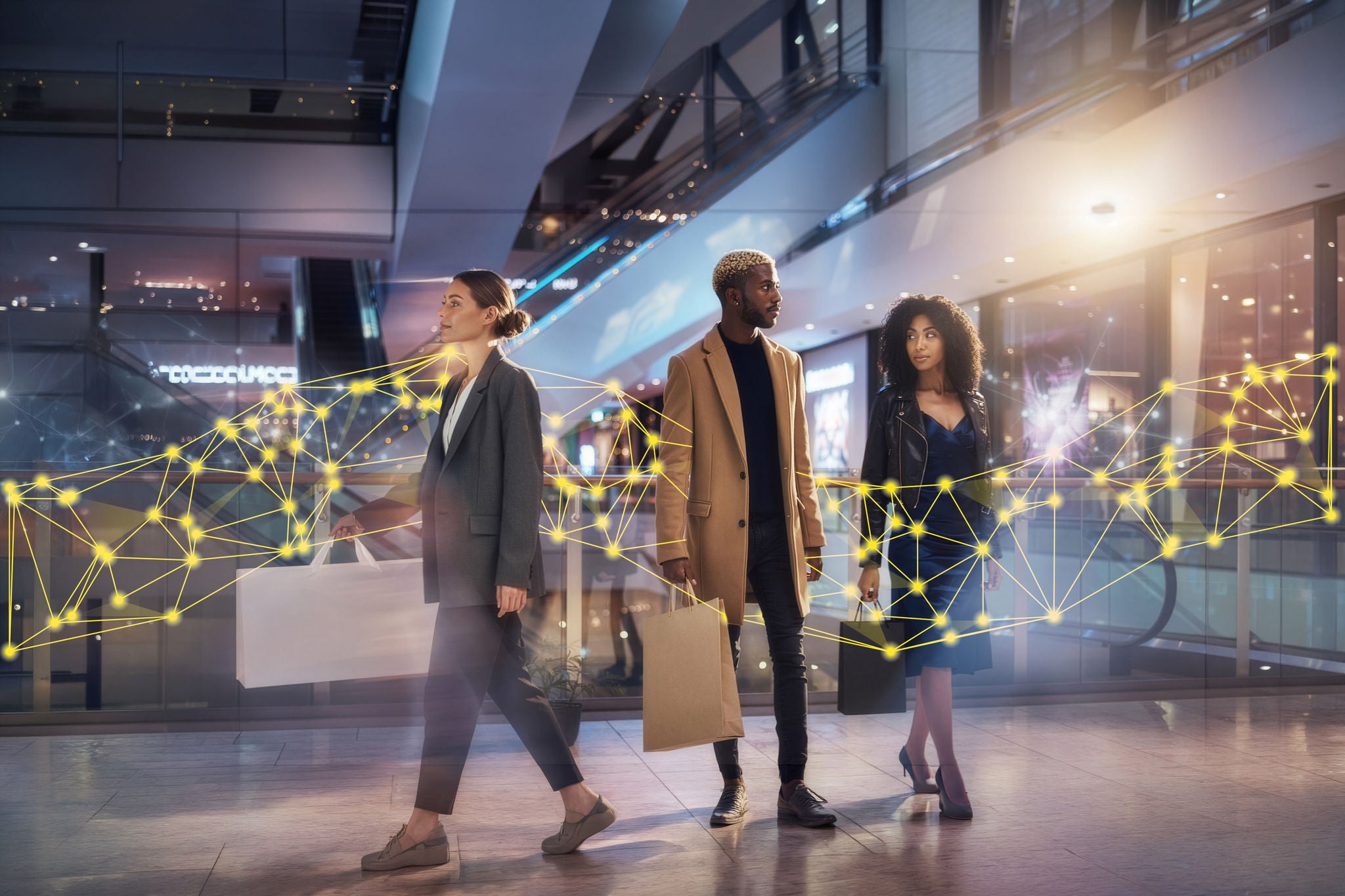 Man working on laptop while sitting in kitchen at home
