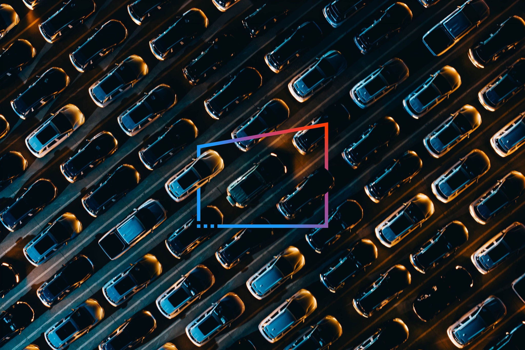 Aerial view of parked cars at night