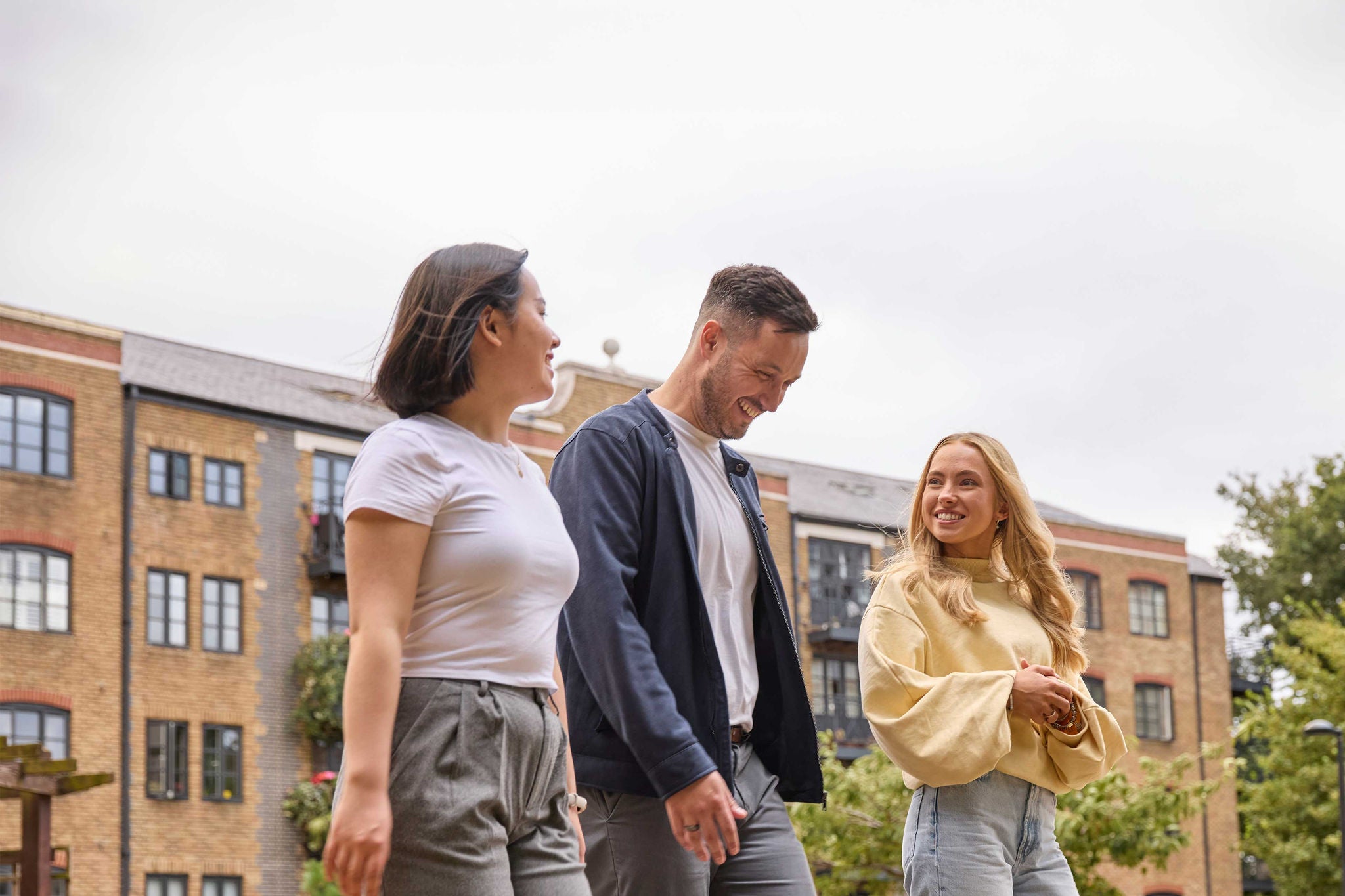 Three colleagues walking