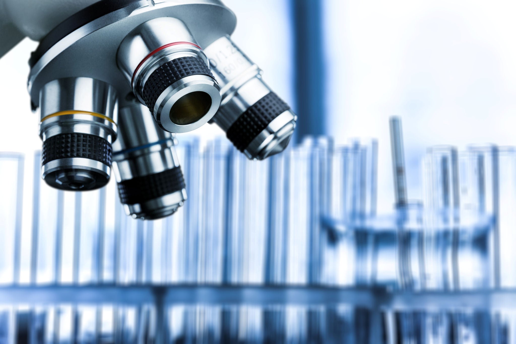 Detail shot of the lens of a microscope in a lab