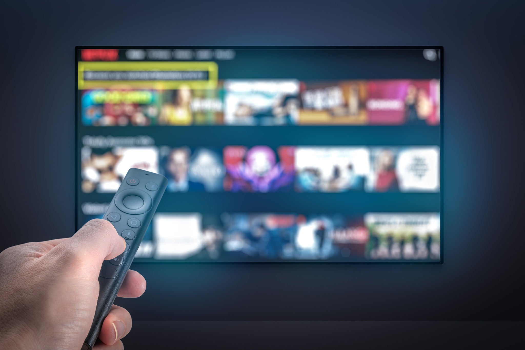 Streaming service. Watching online TV. Multimedia Television video streaming, choosing film to watch with remote. Subscription Streaming video. Internet streaming service concept. TV VOD service