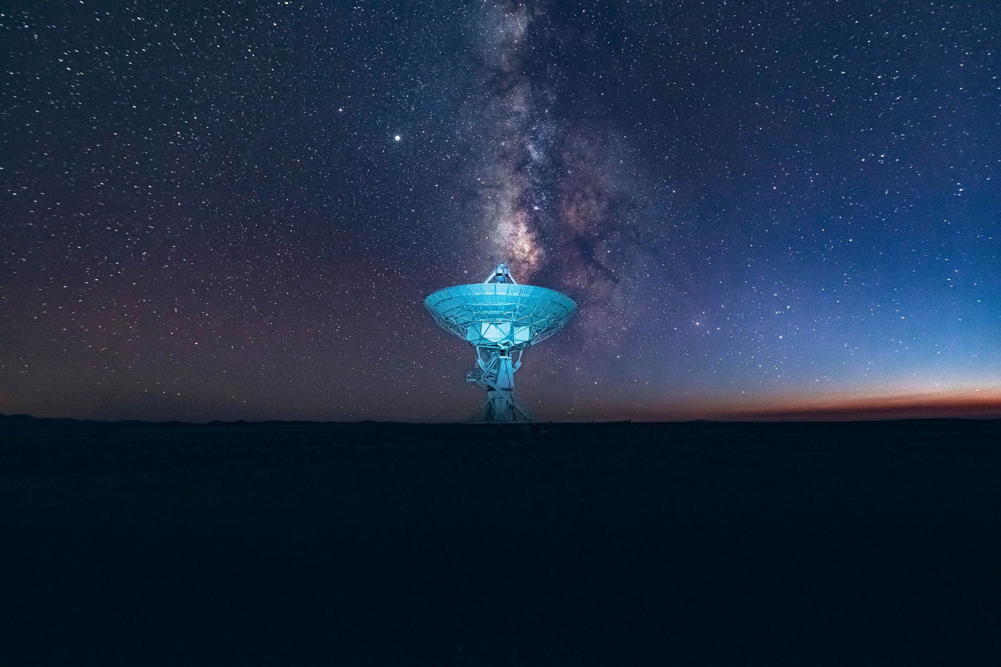 Milkyway moving through portals in different shapes, in minimalistic studio setting in vivid colours