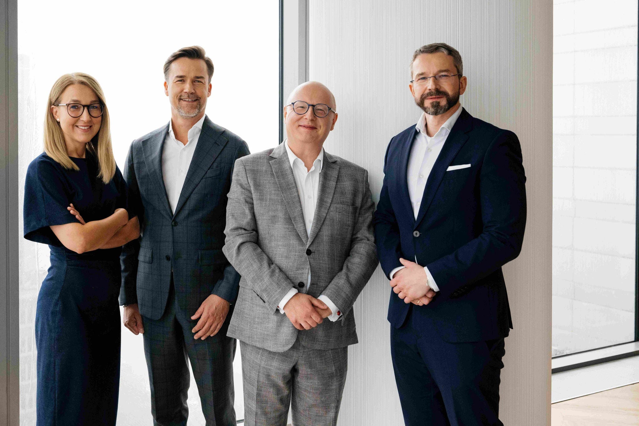 Sławomir Soszyński i Szymon Wałach dołączają do EY Polska
