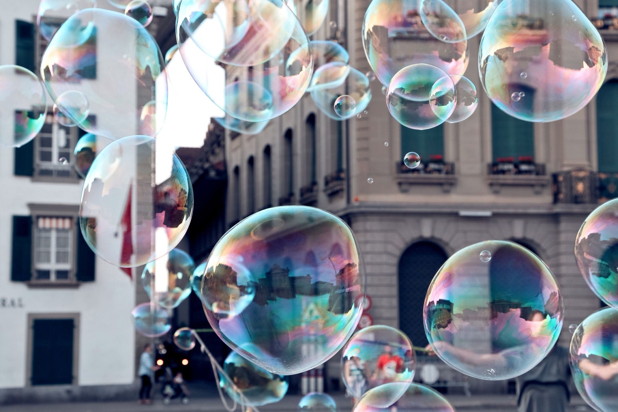 Bubbles on street against buildings