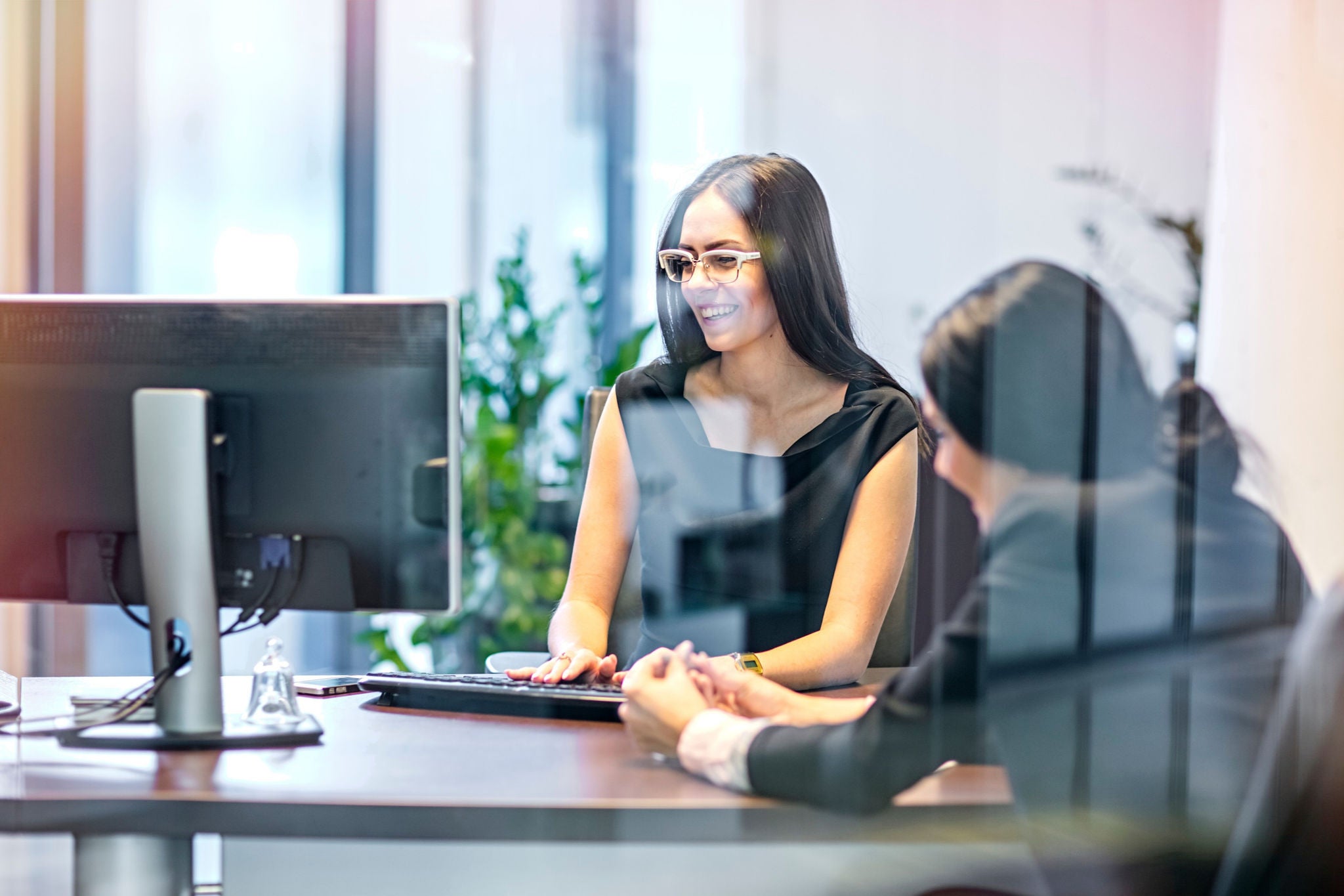 Two women in office version