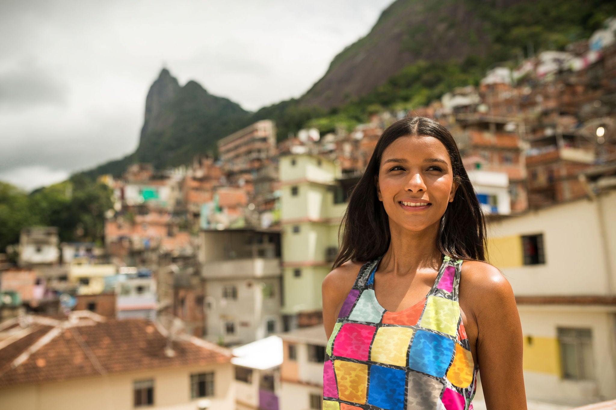 Young woman in favela santa marta rio de janeiro brazil background
