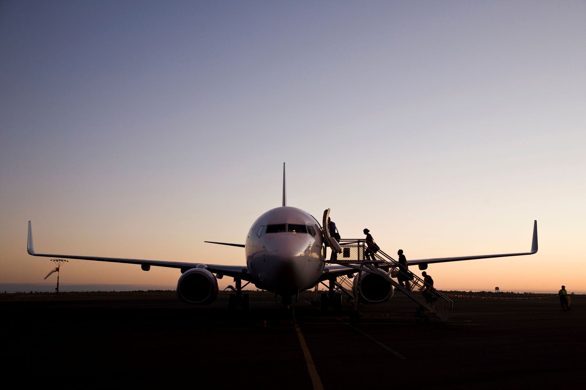 People boarding a plane.