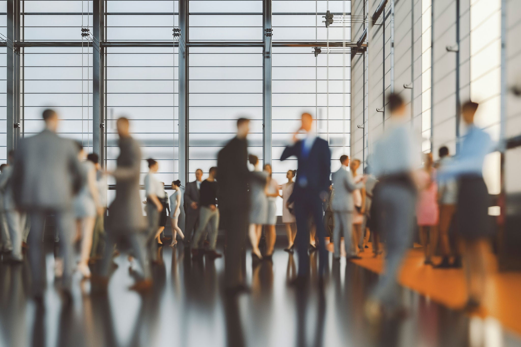 Personas reunidas en una sala de conferencia