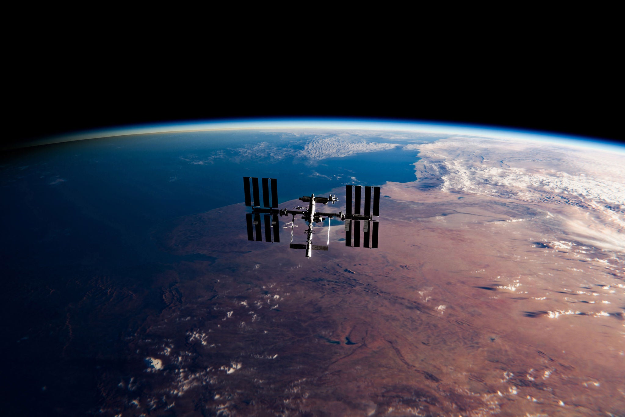 international space station orbiting earth in space