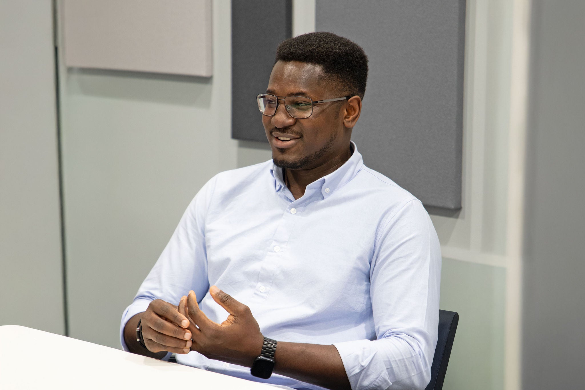 Person sitting in a meeting room