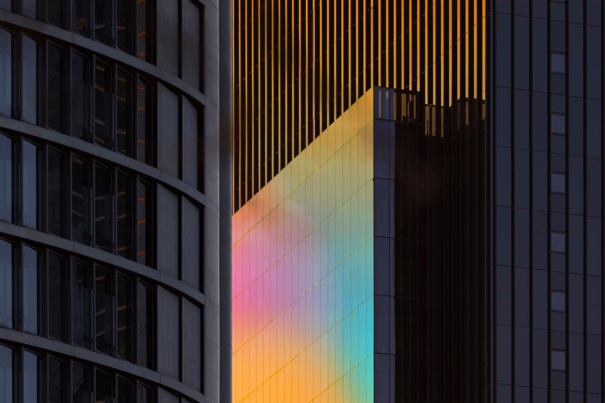 Abstract architectural façade with illuminated geometric patterns