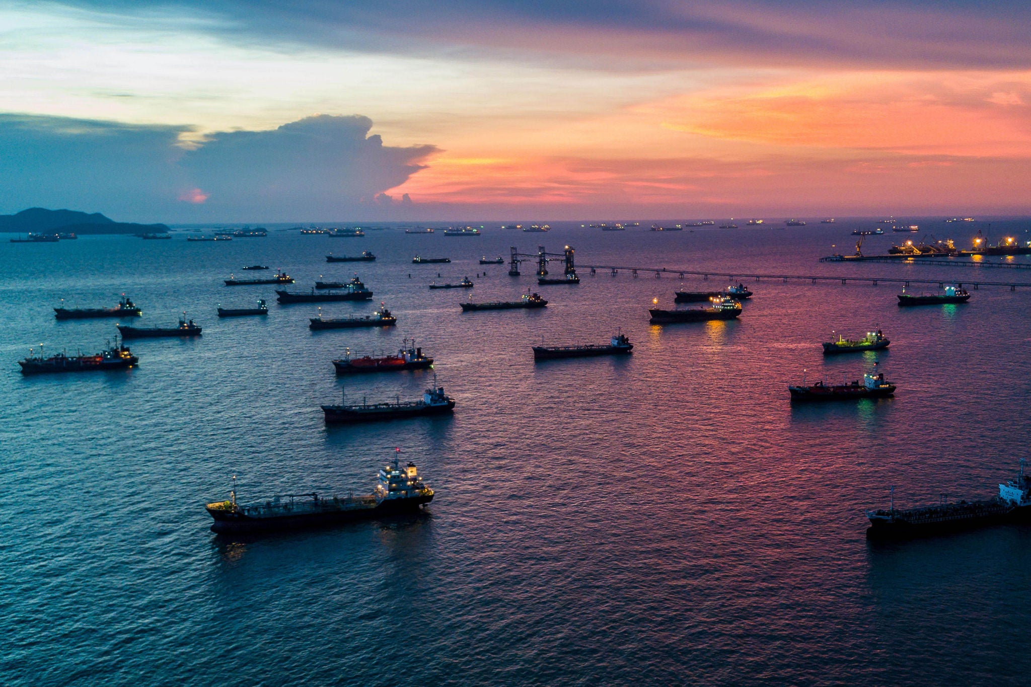 Aerial view oil and gas tanker ship industrial crude oil fuel and petrochemical tanker ship, Global business import export oil and gas petrochemical with tanker ship.