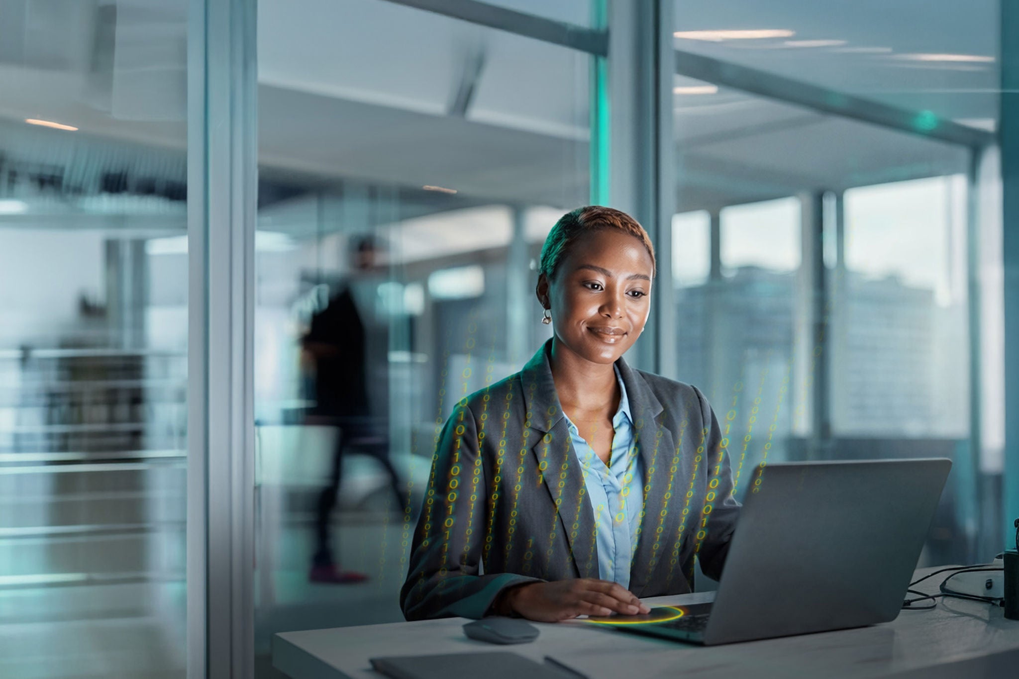 Business person working on laptop in office