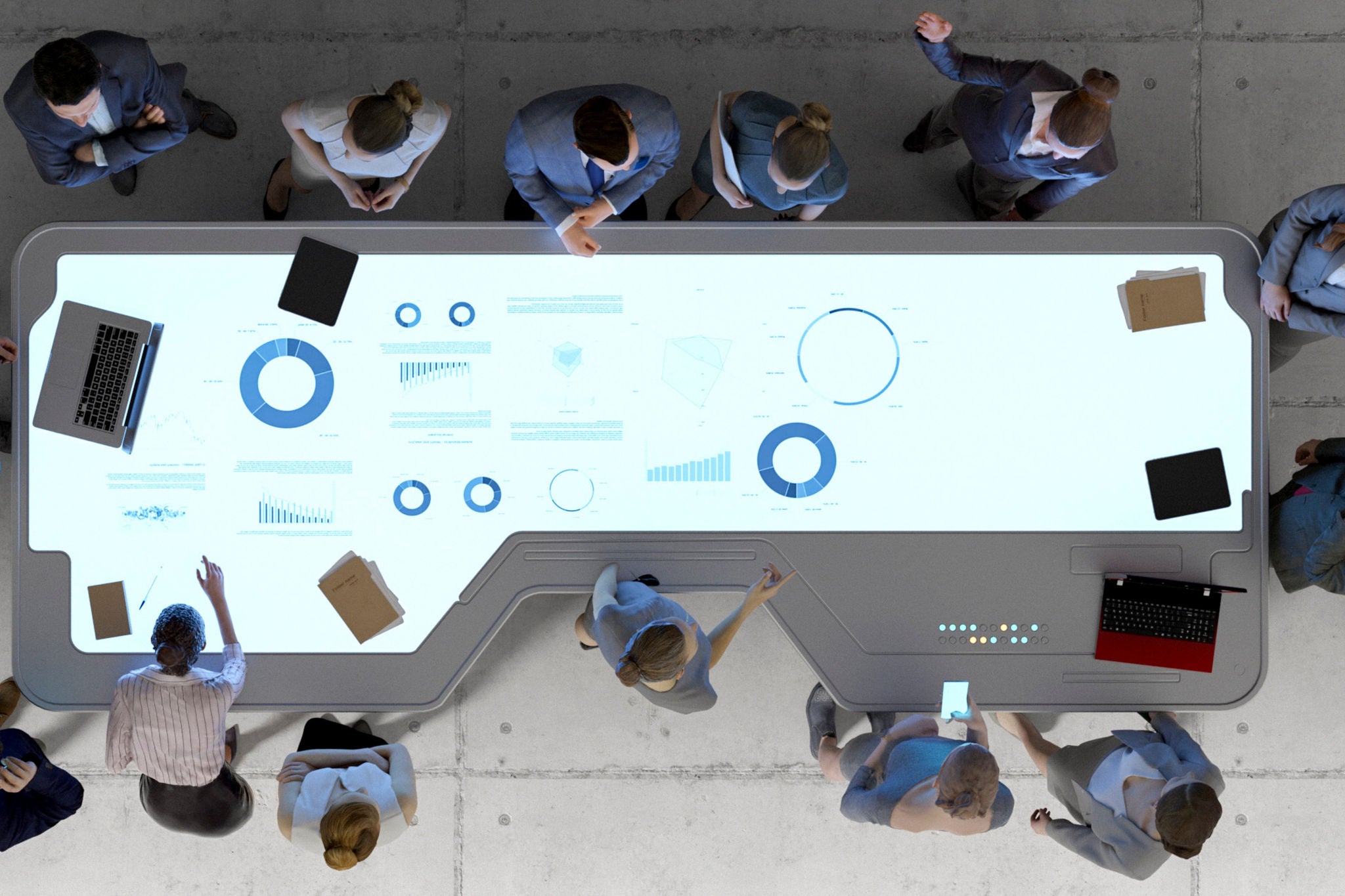 Businessman and businesswoman in meeting using a futuristic desk