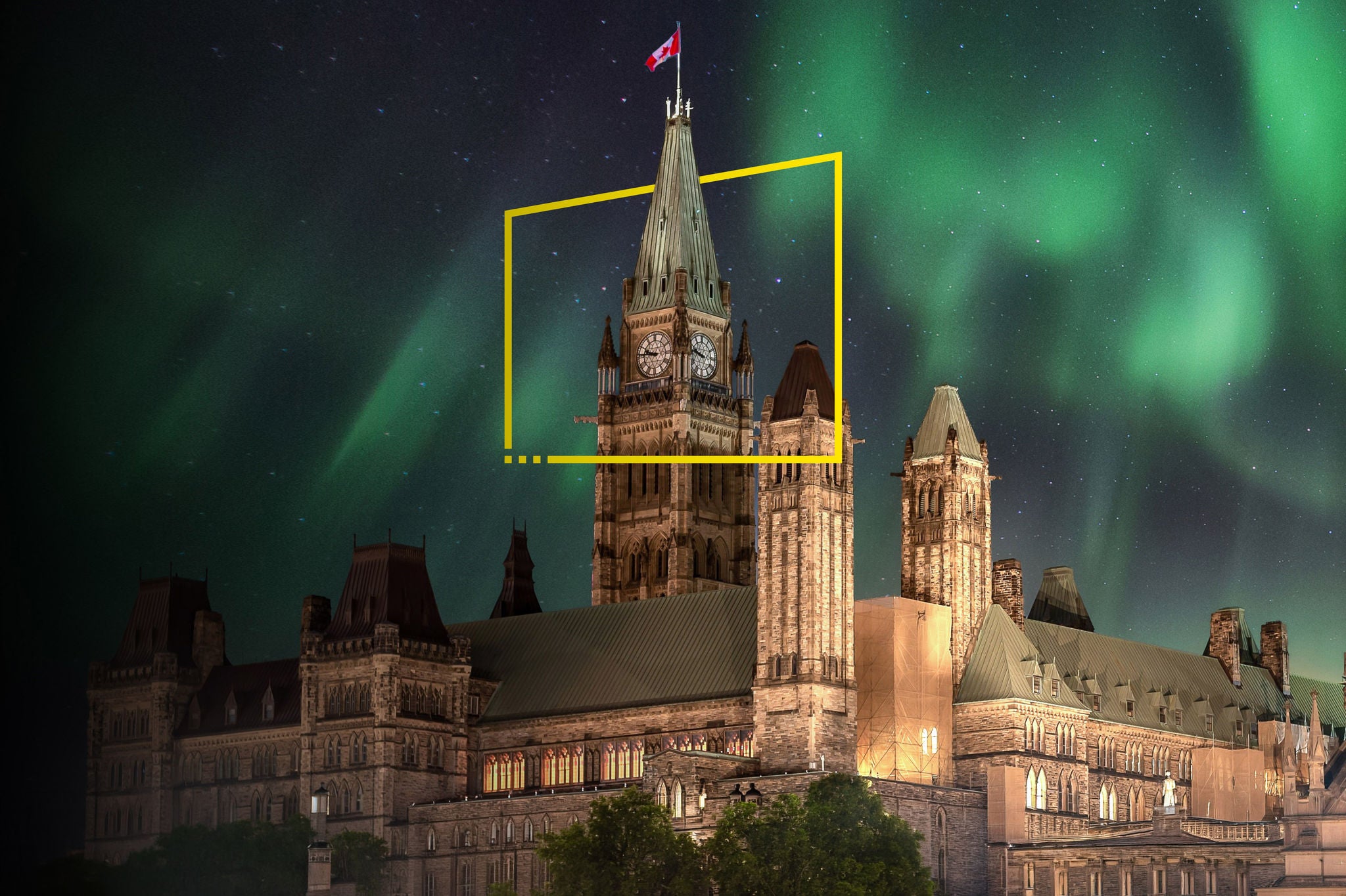 Parliament Hill under the northern lights with a Canadian flag