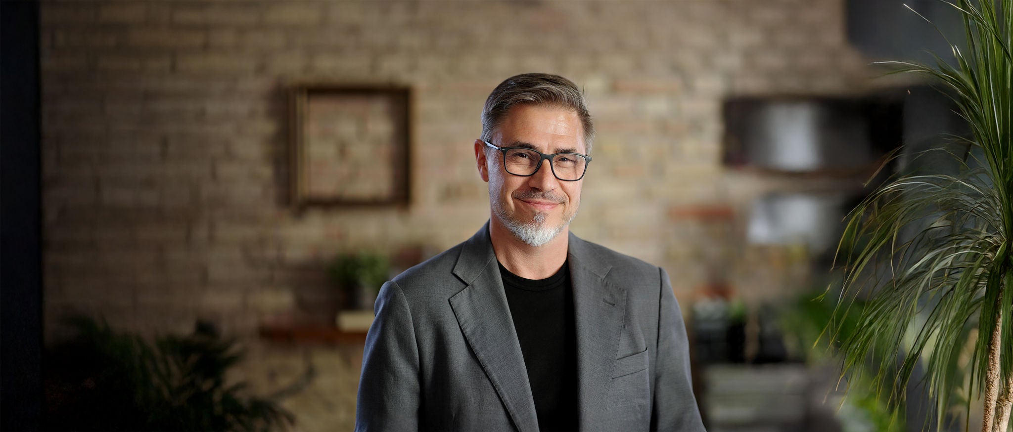 Middle age businessman in business casual. Entrepreneur in jacket. Mid adult, mature age man, happy smiling. Portrait with copy space.