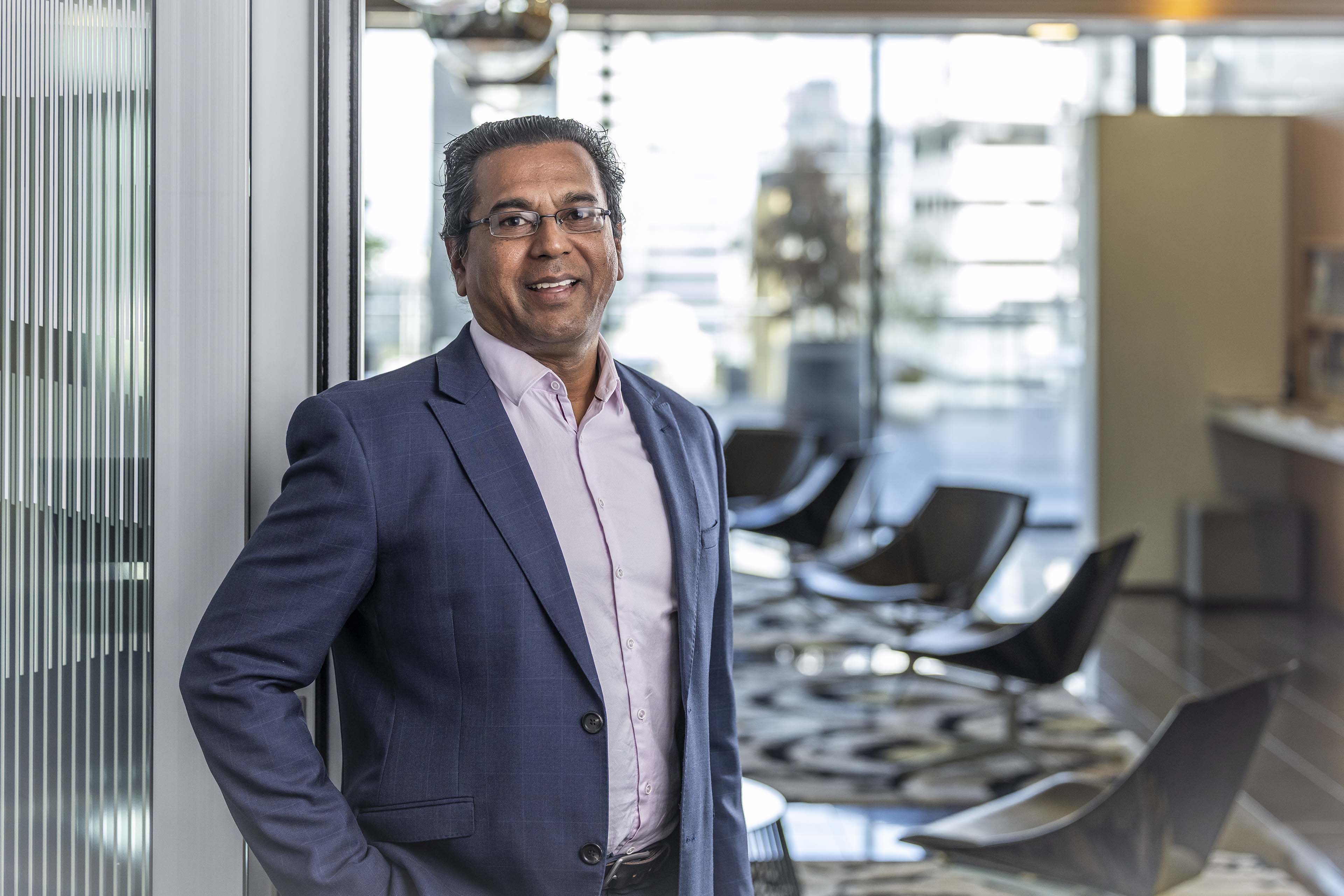 A photographic portrait of Sanjay Kumar