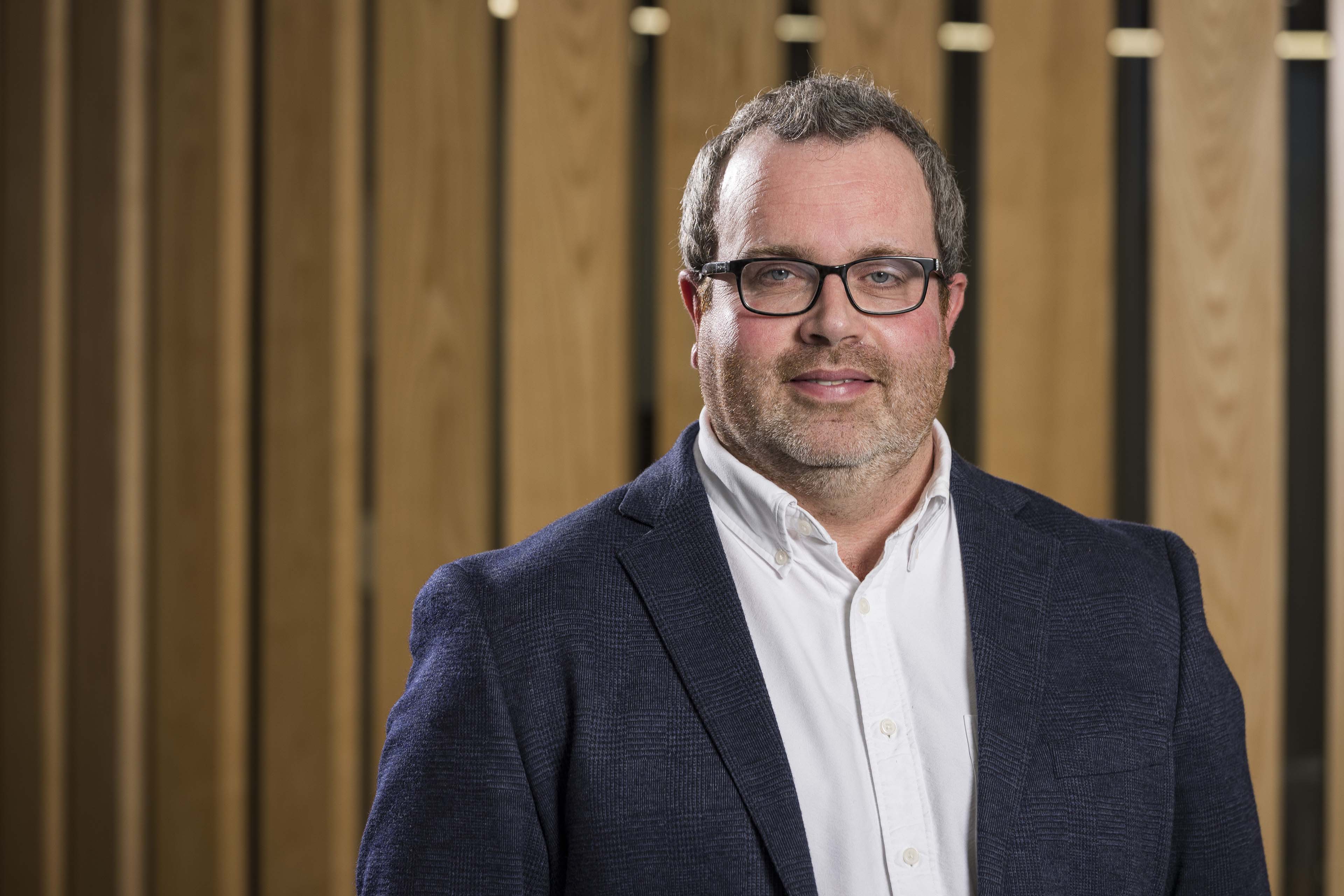 A photographic portrait of Simon Scoulding