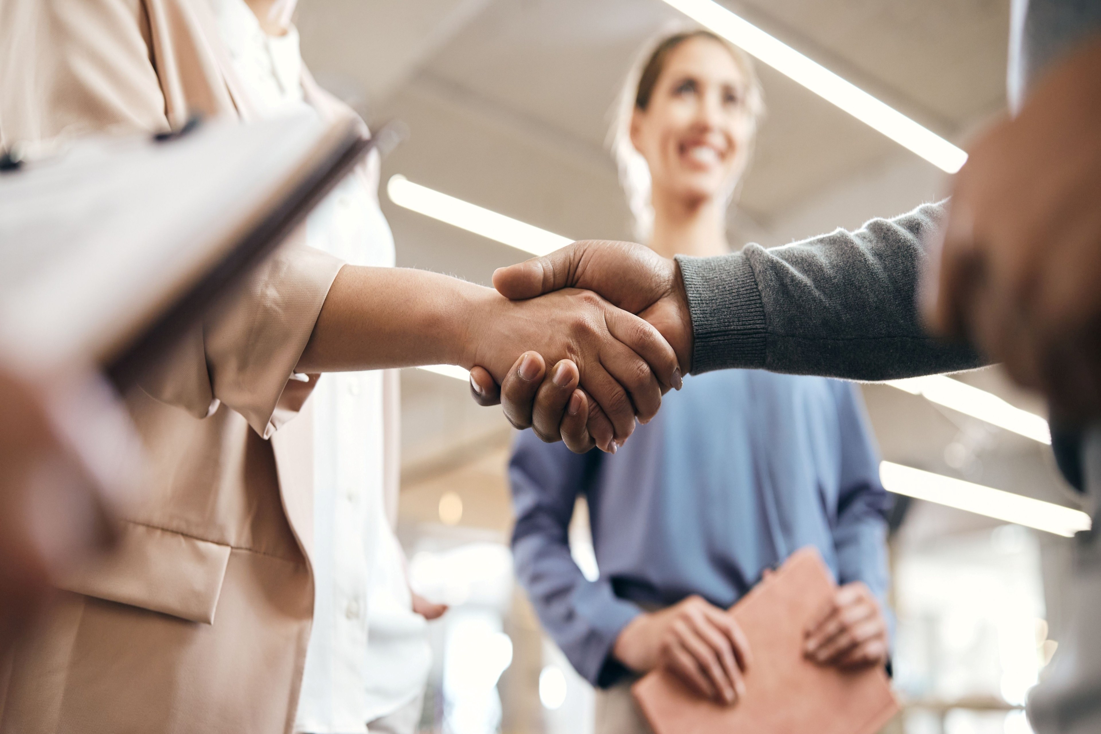 people shaking hands
