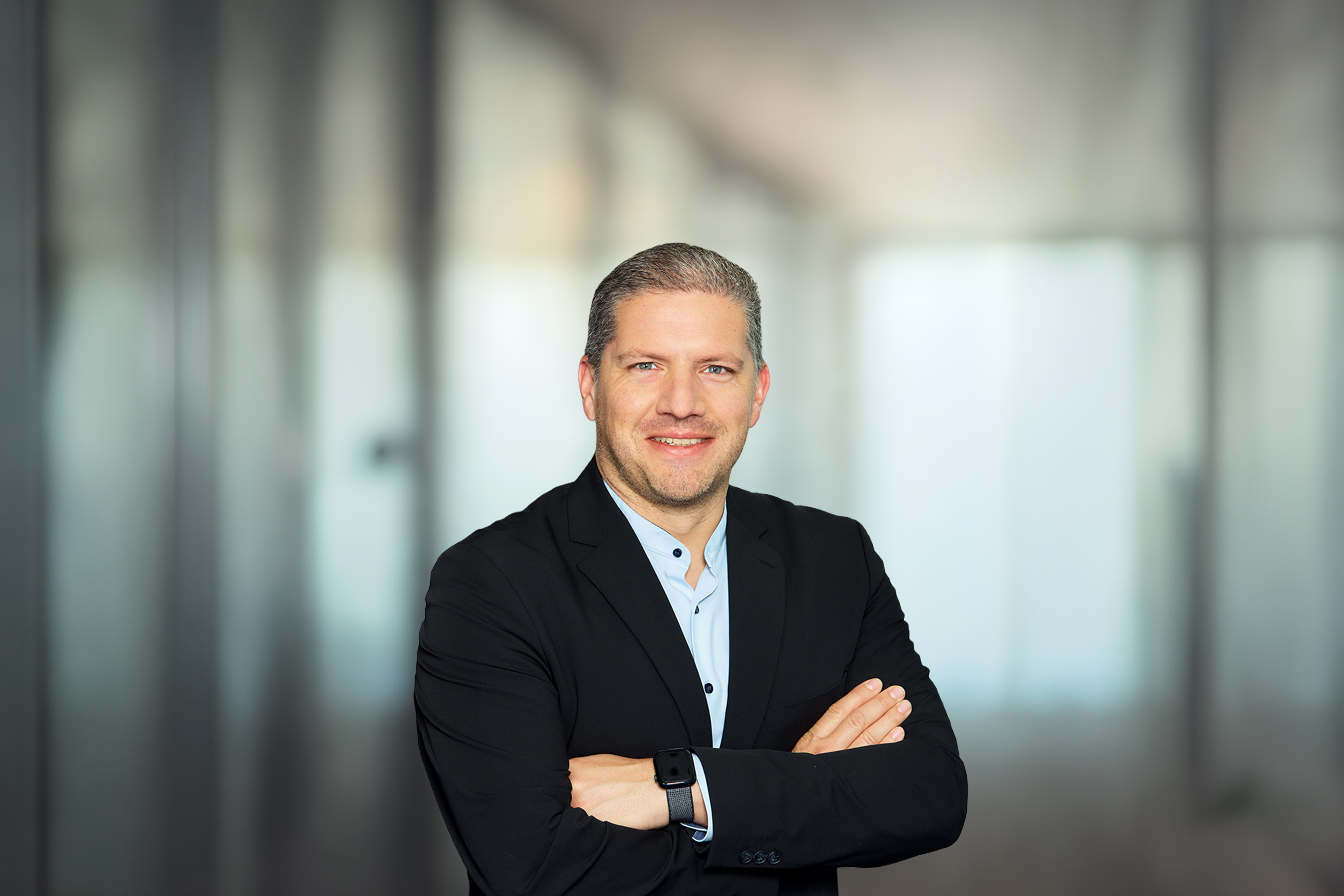 Porträtfoto von Christian Mayr, Head of Sovereign AI, EY