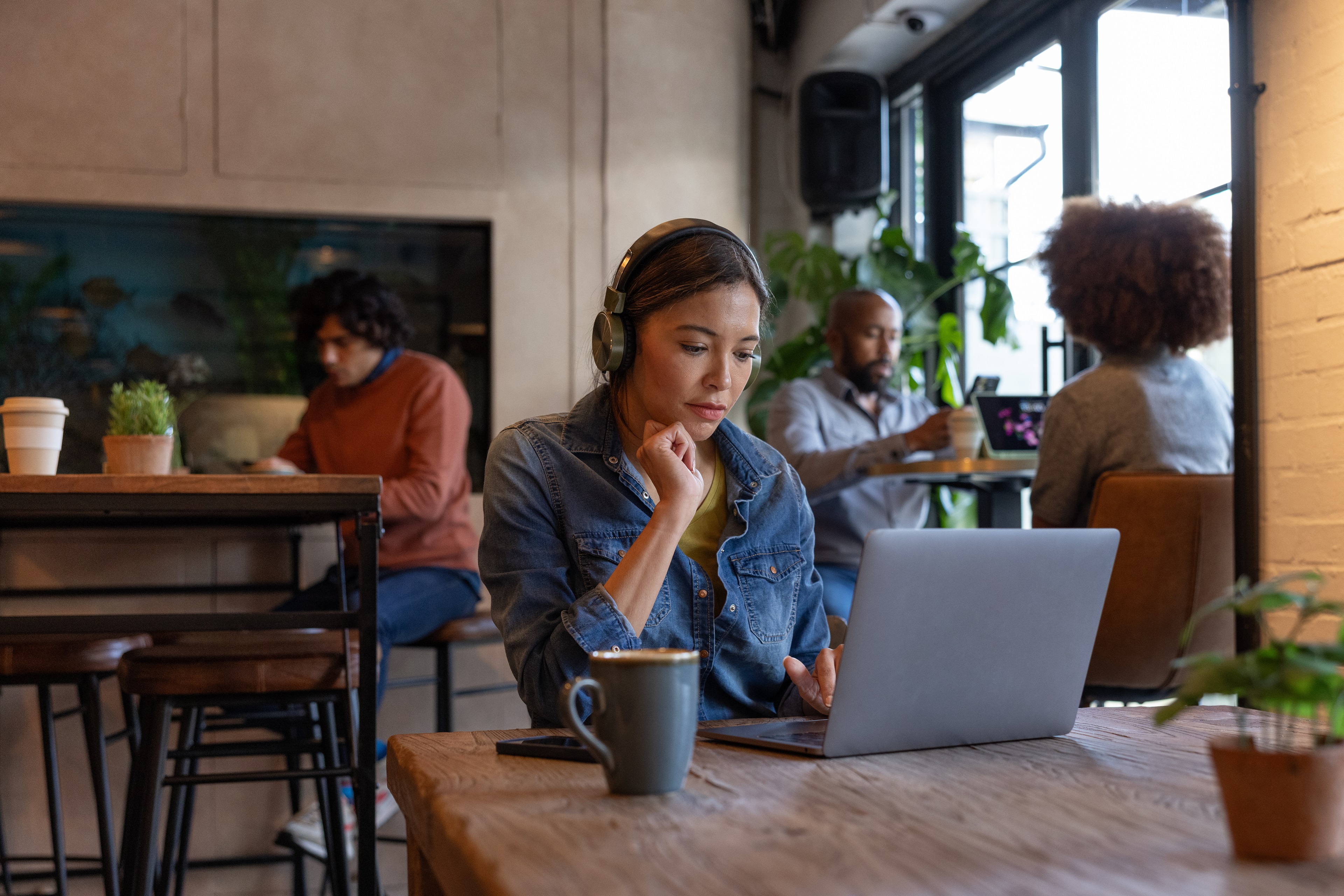 Young Asian businesswoman with passport 