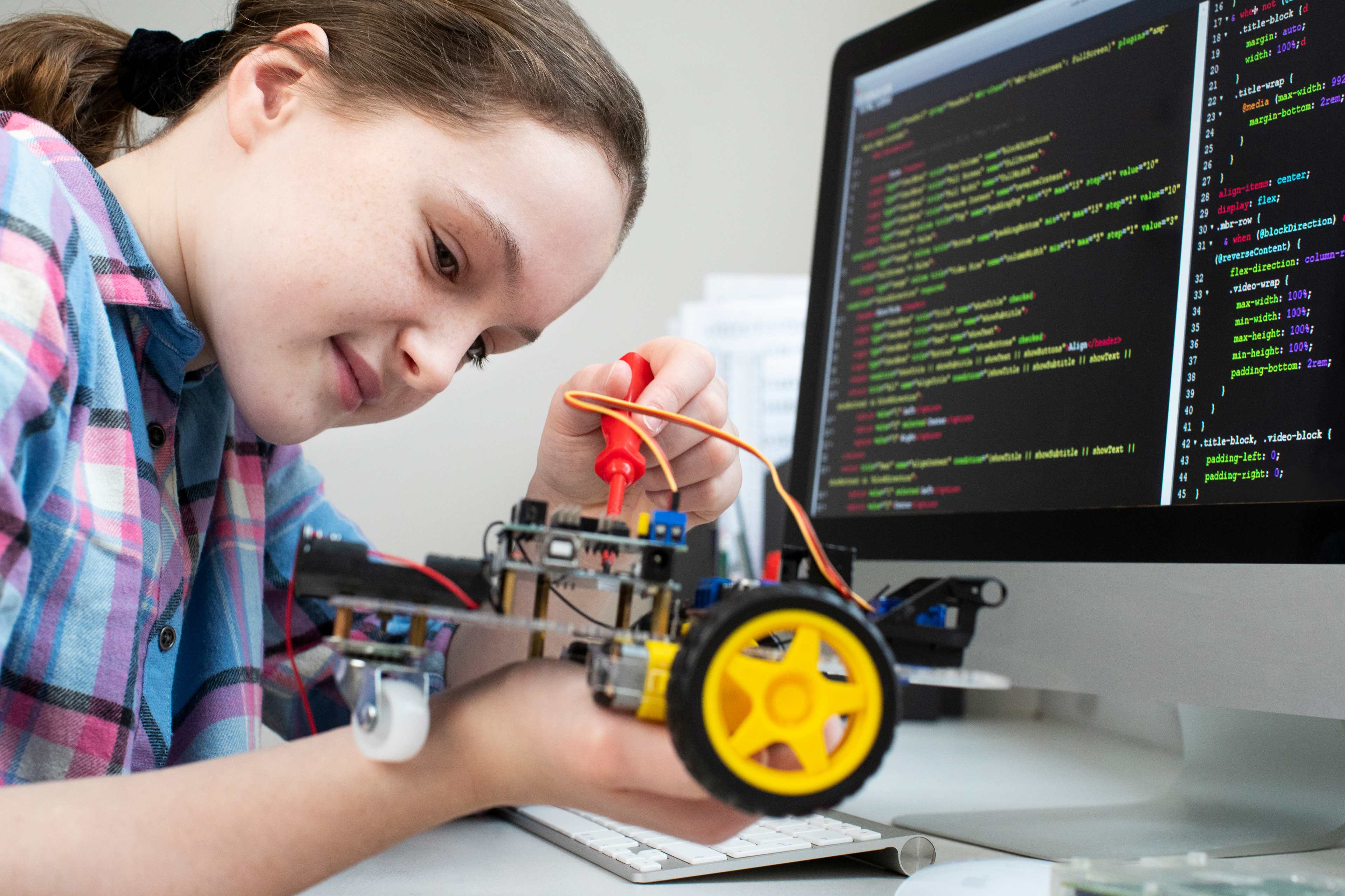 stem innovation - young student in robotics lab