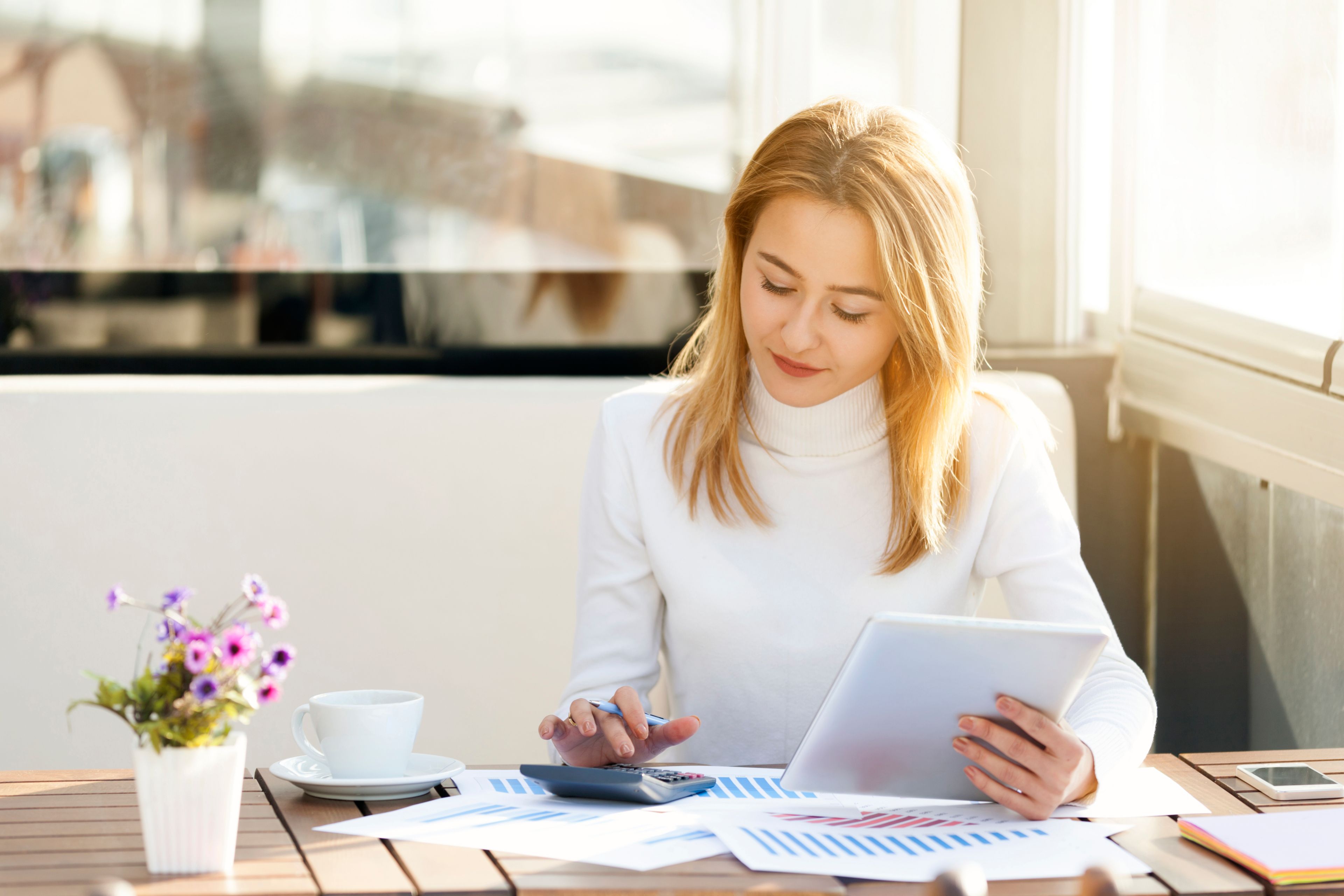 finance executive using a smartphone 