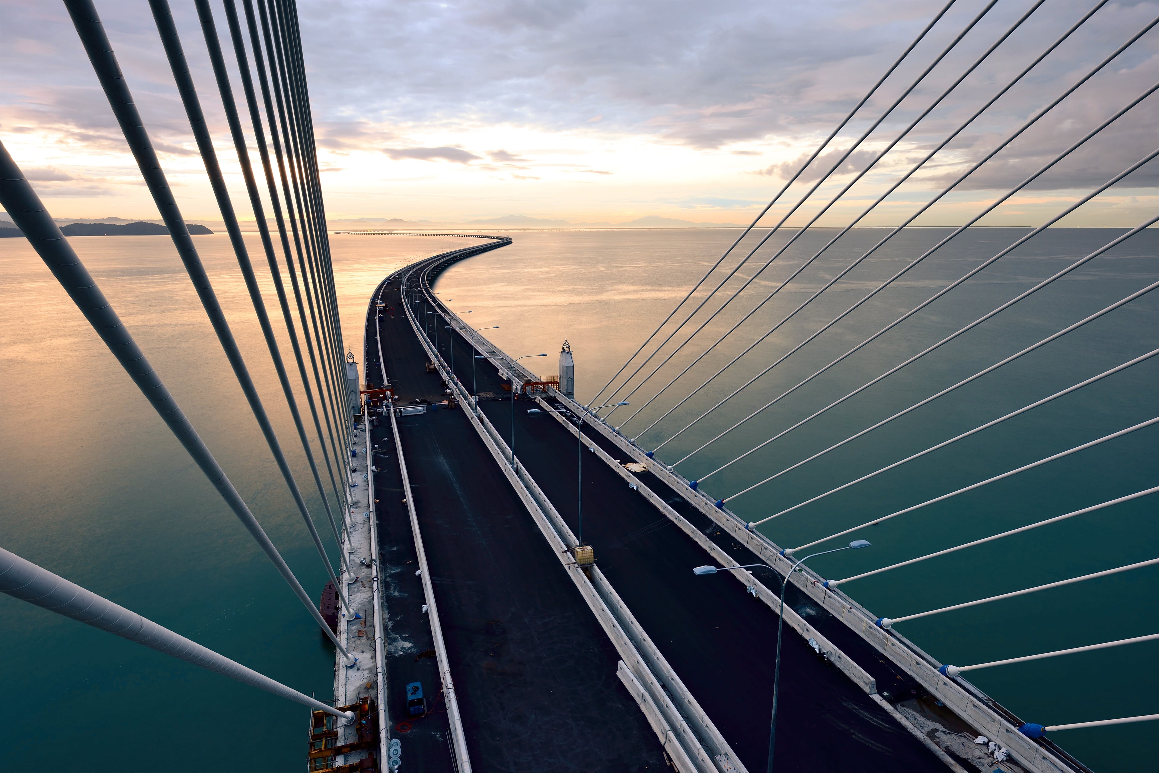 A low-angle view of several modern skyscrapers with reflective glass facades
