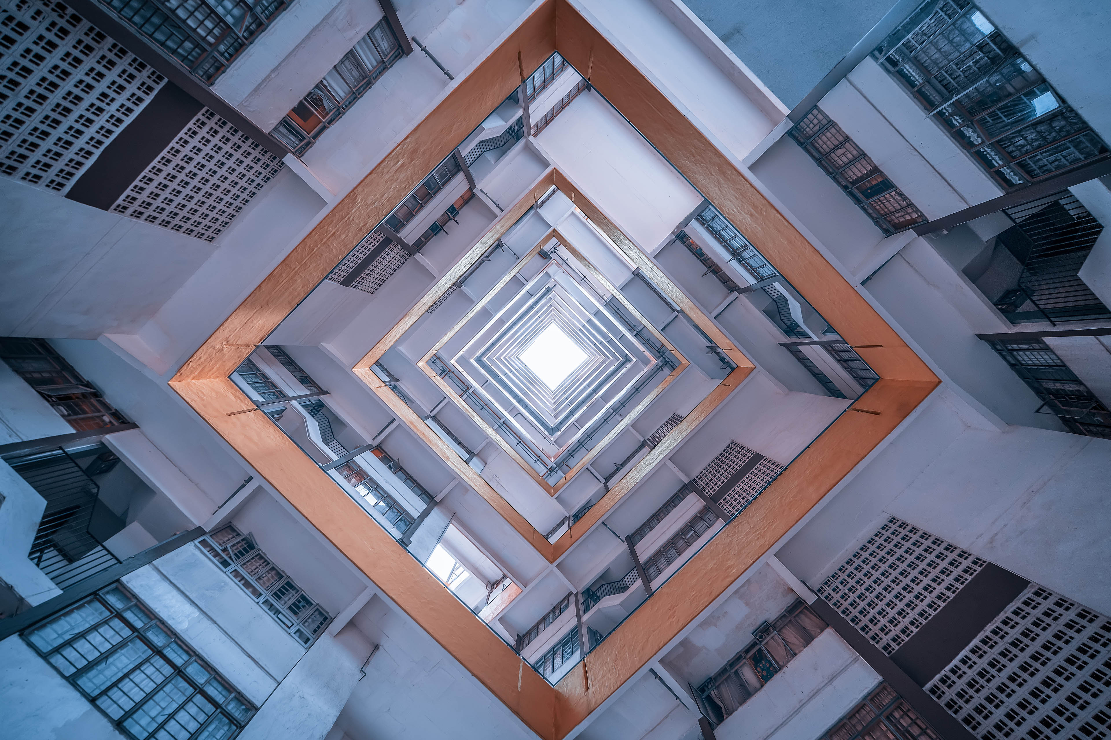 Directly below shot of modern building against sky
