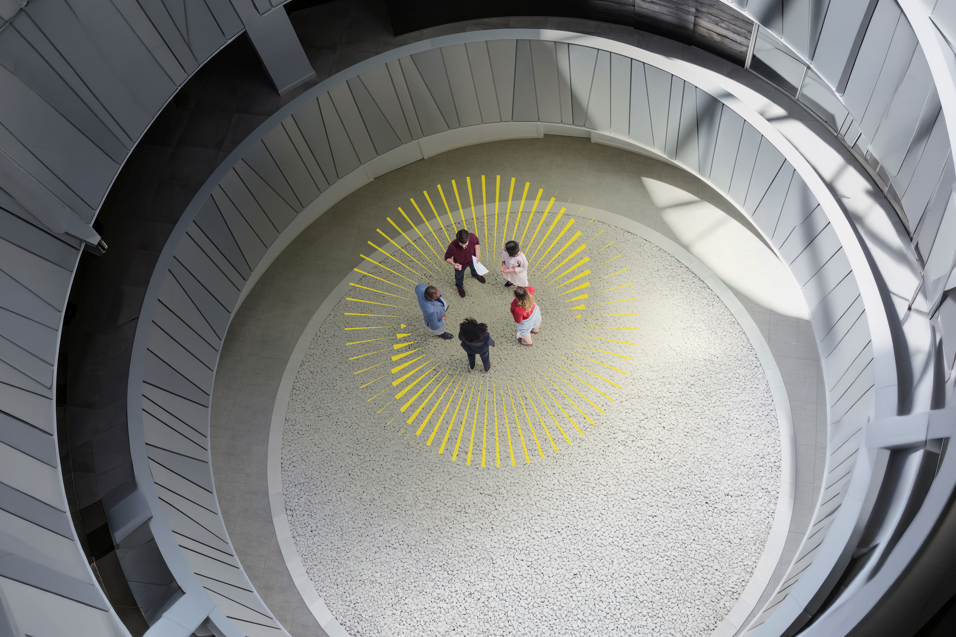 Overhead view of collaborative team in circle