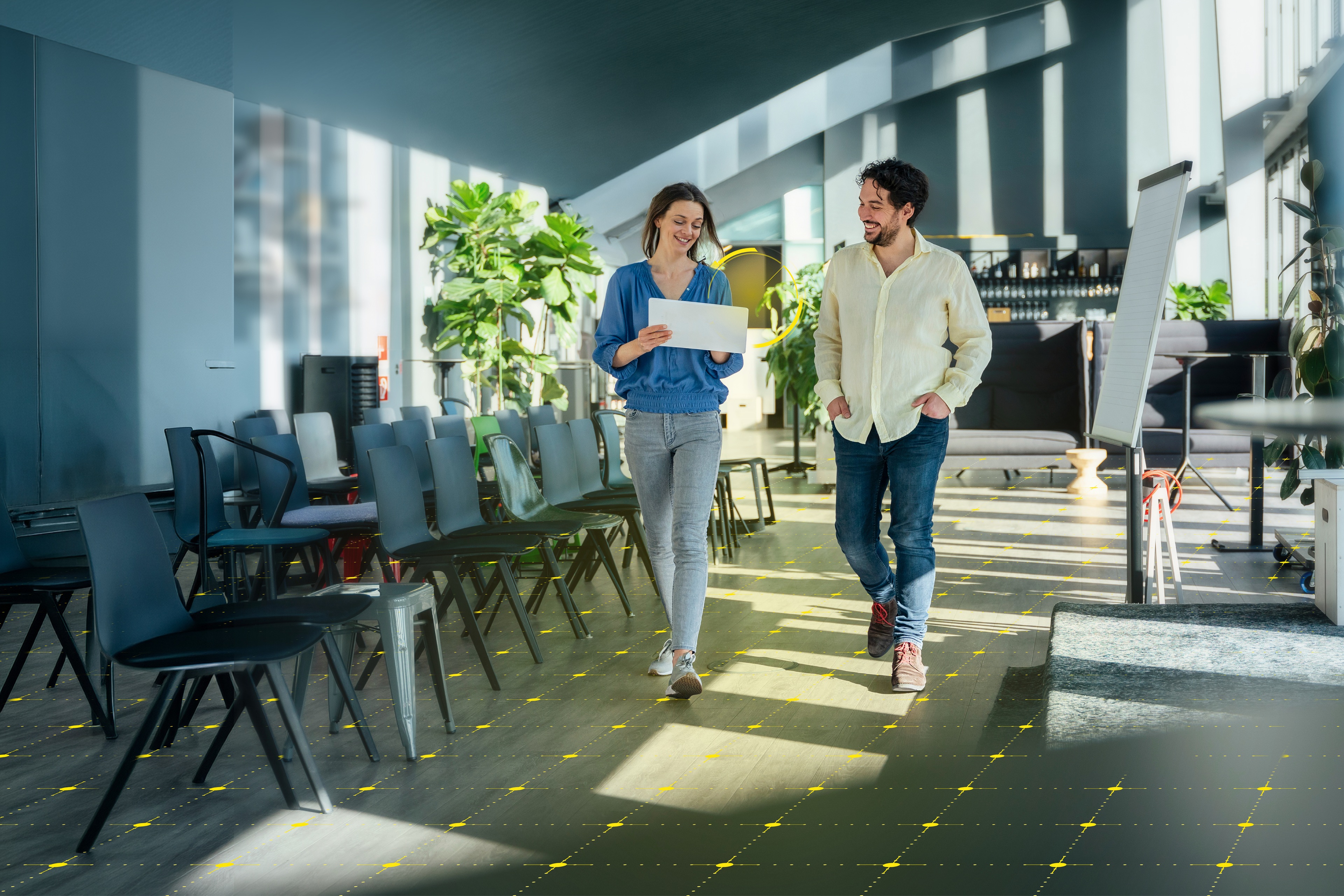 Two professional talking about AI in the office