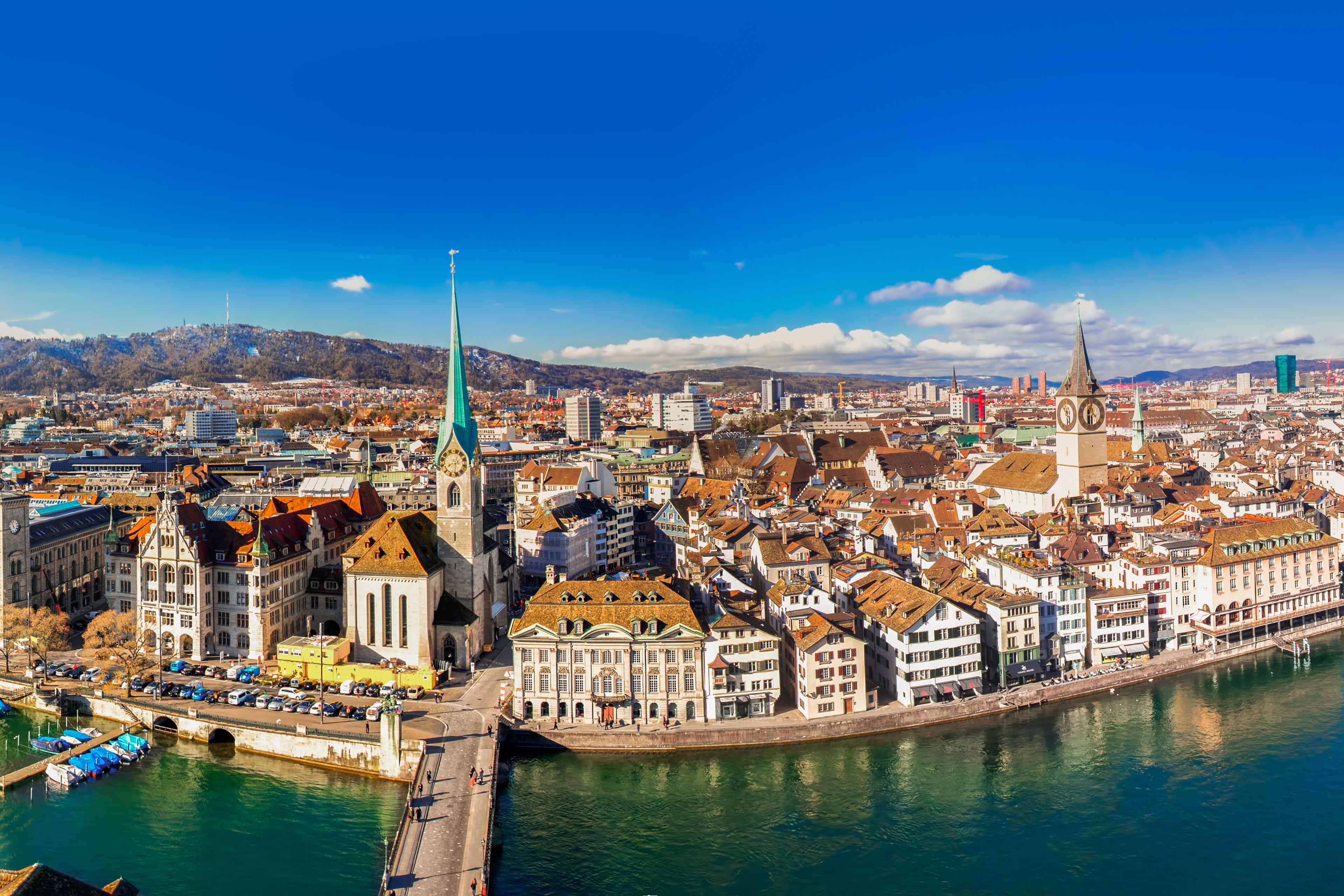 Historic Zürich city center with famous Grossmünster Church, Limmat river and Zürich lake. Zürich is the largest city