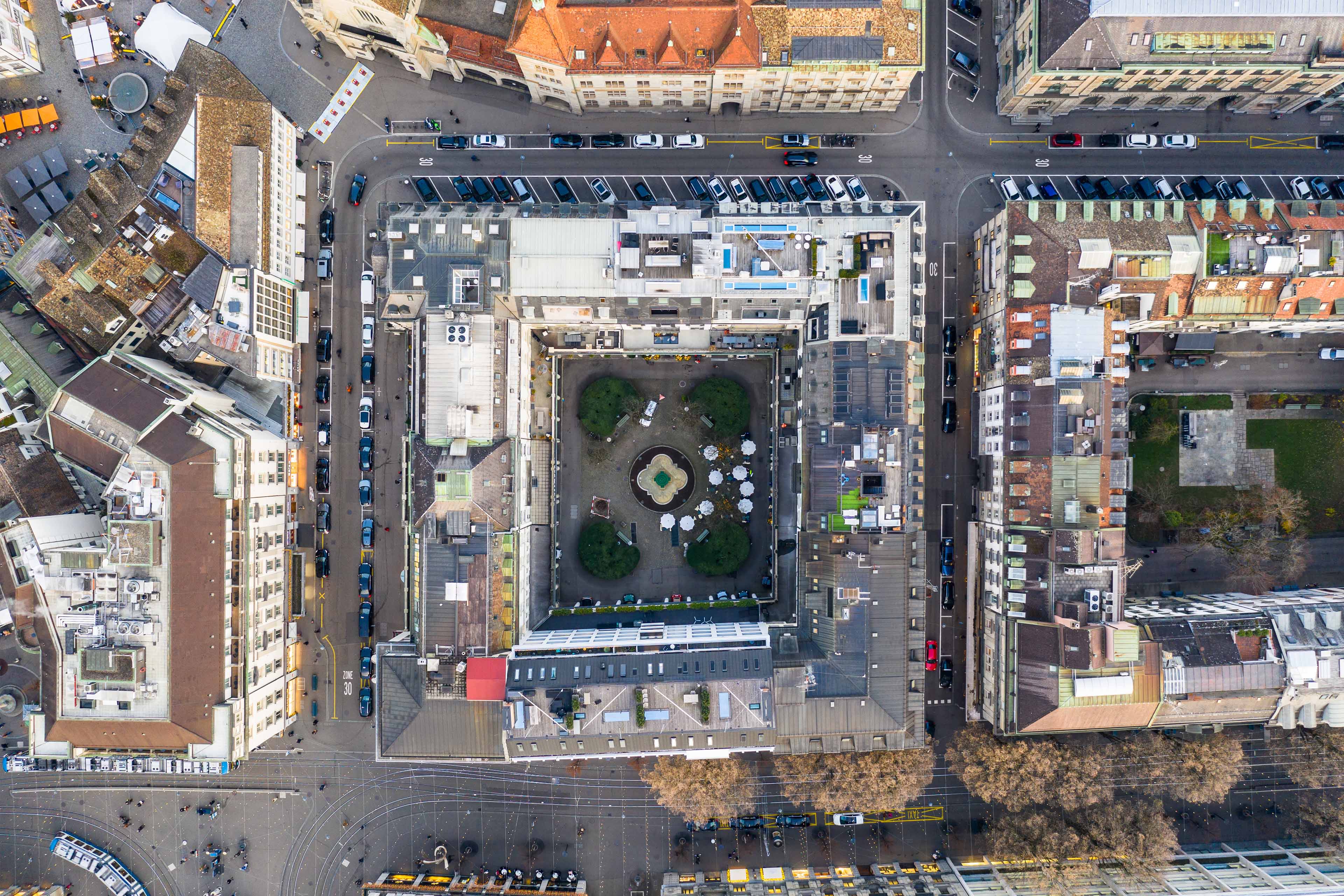 zurich switzerland aerial overhead drone view of luxury real estate properties along the bahnhof strasse the main street