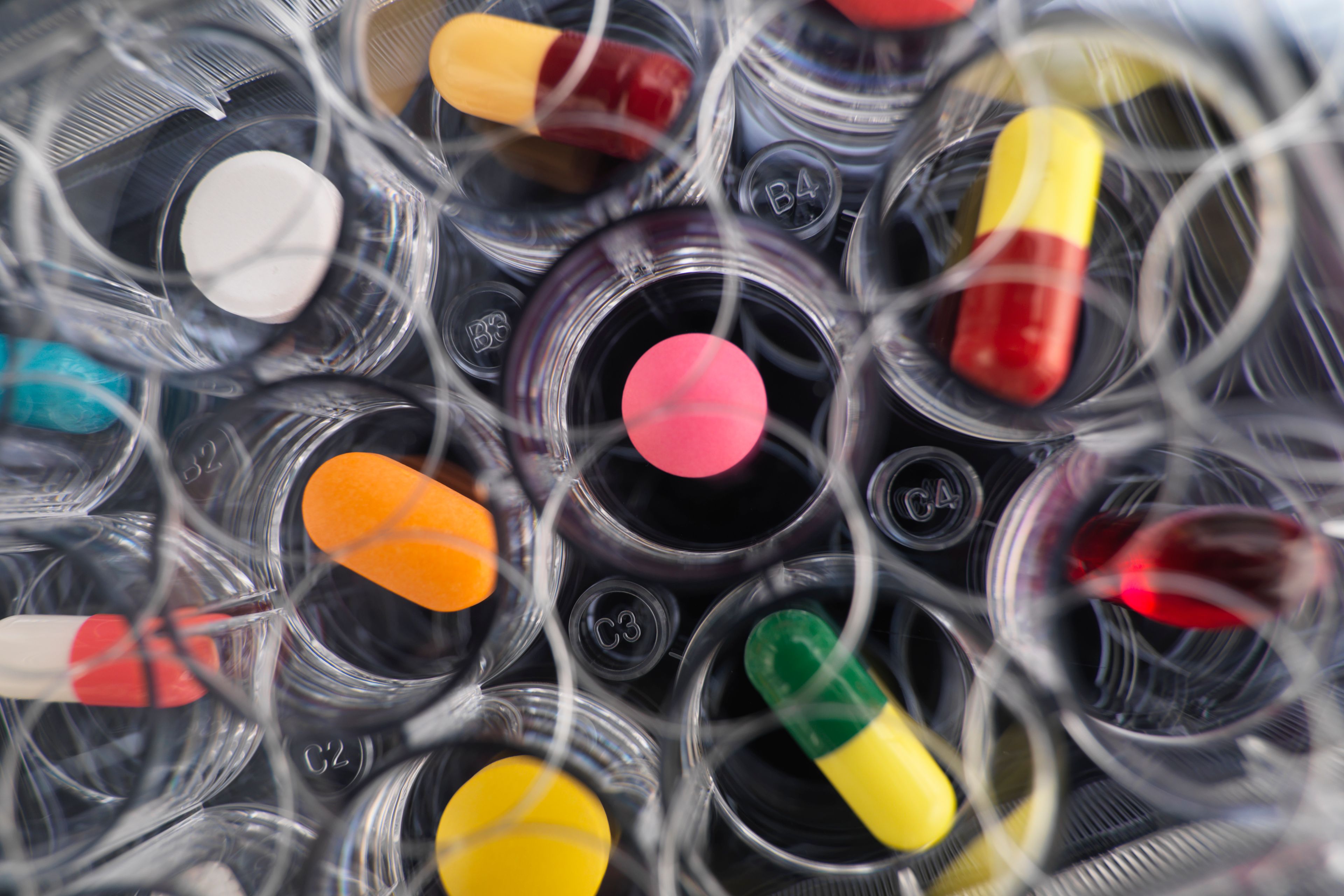 Overhead close up of variety of medical drugs for laboratory testing