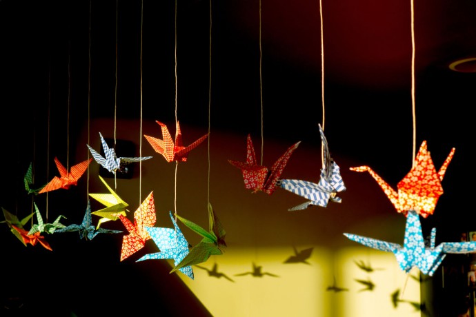 Origami brids hanged with threads