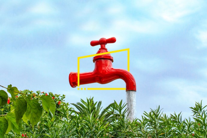  Looking up at a large red flowing tap outdoors