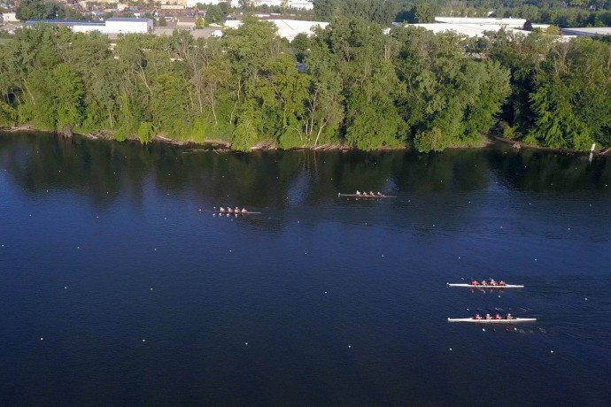 Arial side view of rowing race still