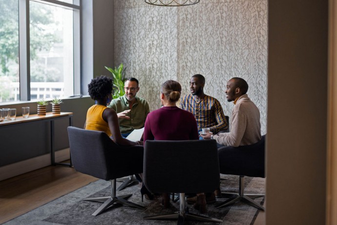 Diverse business people having a casual meeting together in an office