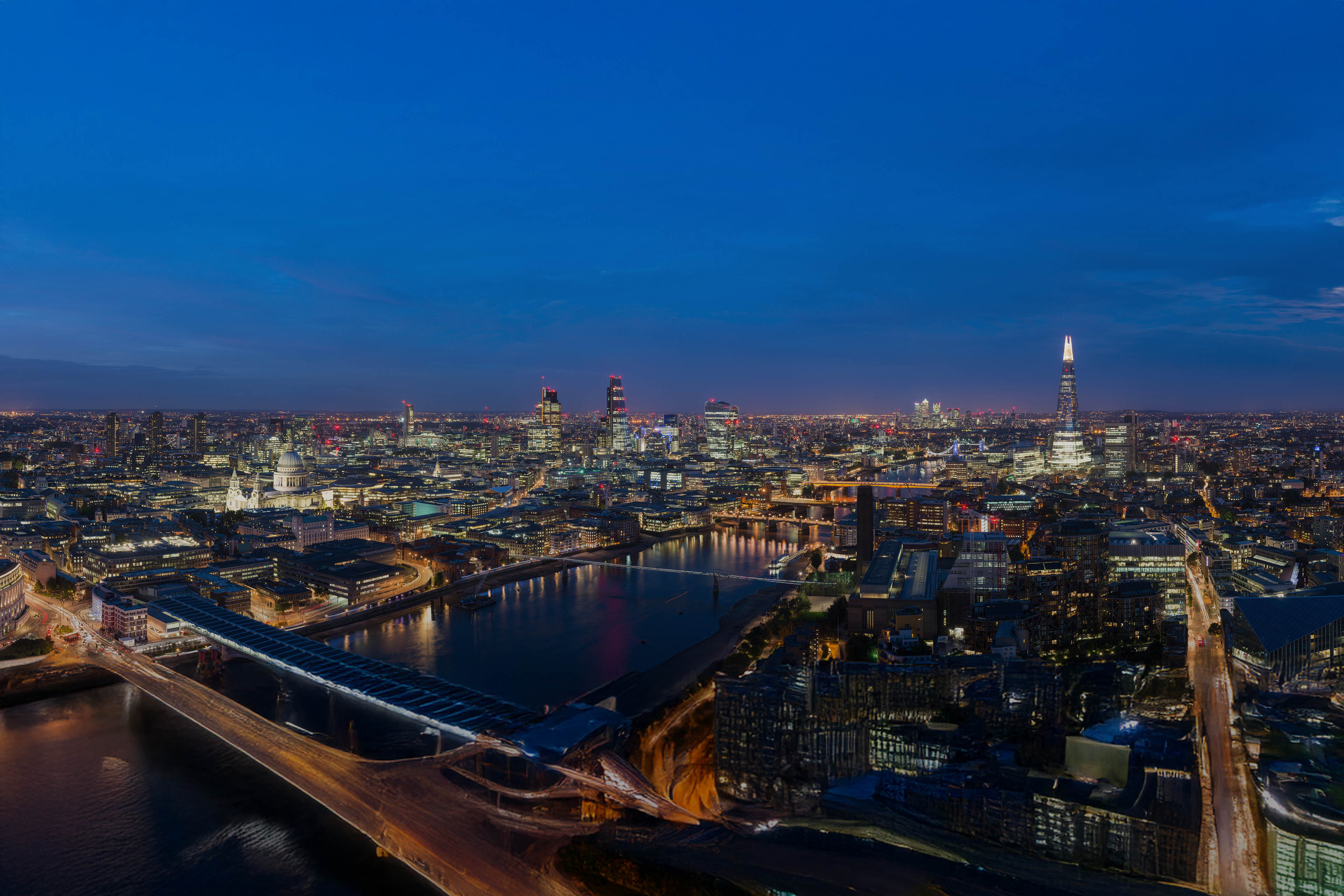 A night-time panoramic view of London and the River Thames from the top of Southbank Tower