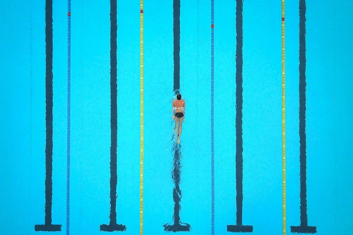 High angle view of an athlete swimming in pool