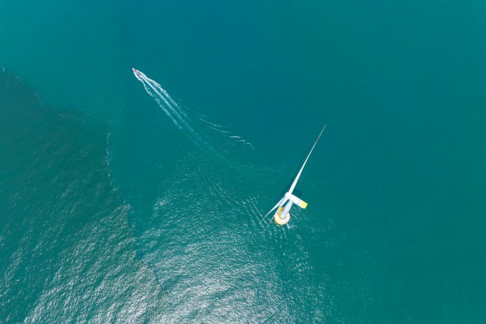 Aerial view of the majestic offshore wind turbine farm