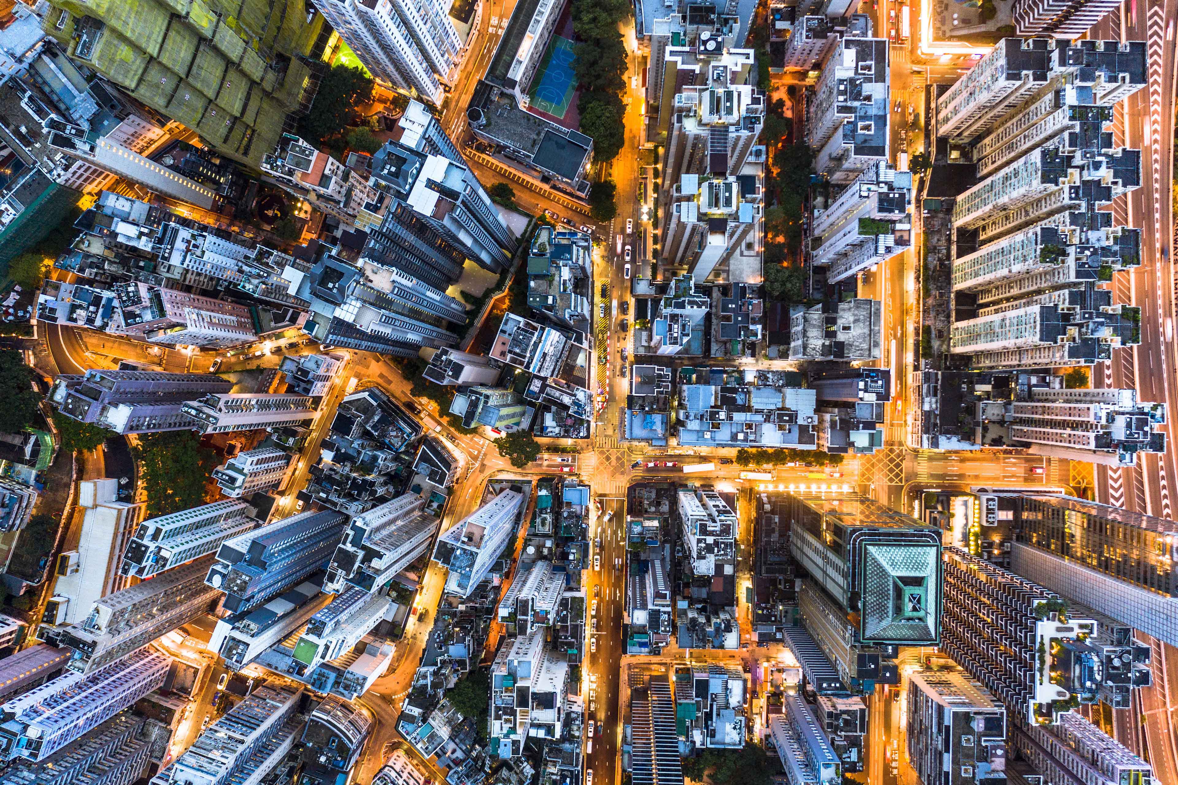 Stunning aerial view at night of the very crowded Hong Kong island streets, Shot above the Sai Yin Pun district