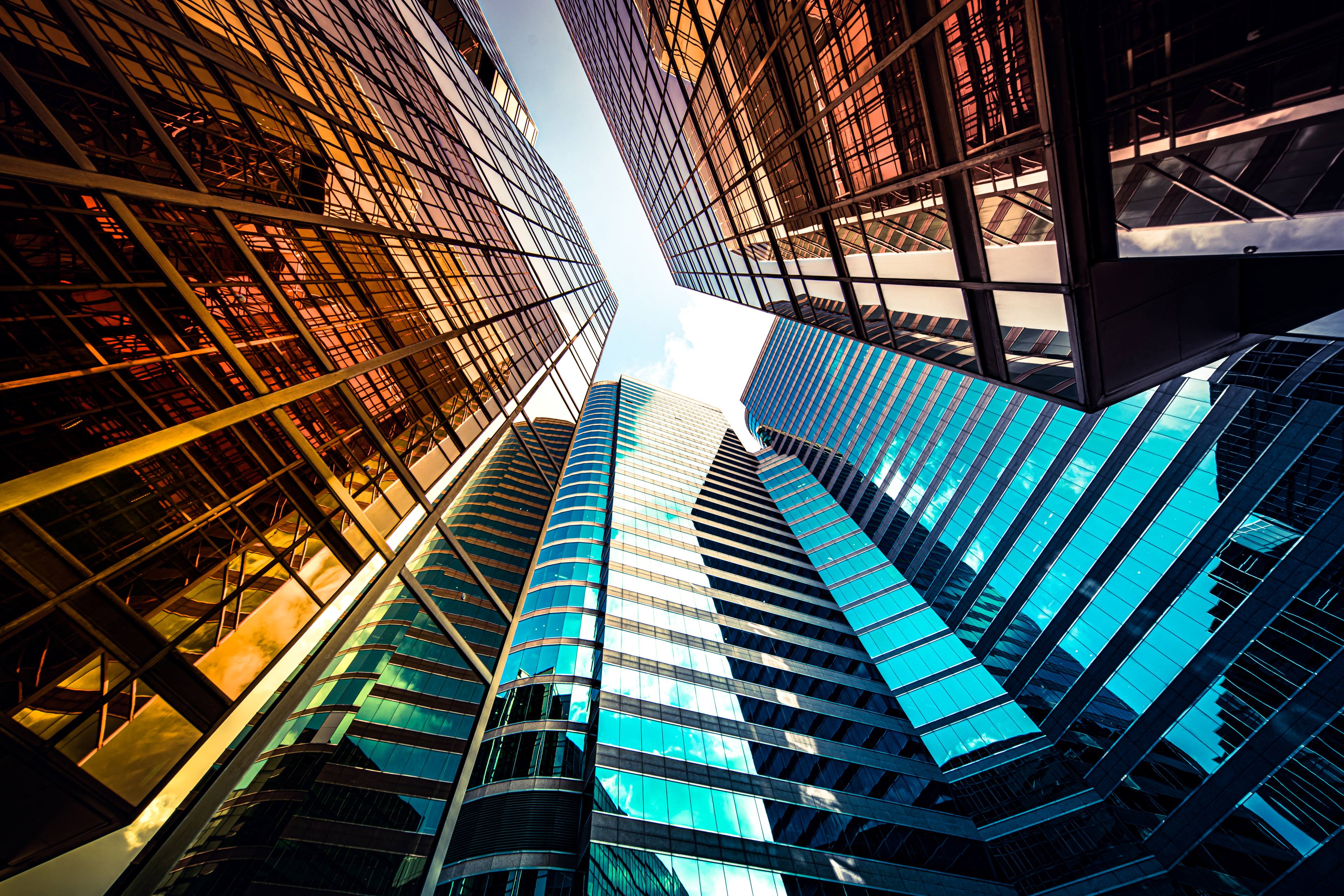 Bottom shot of buildings looking up the sky