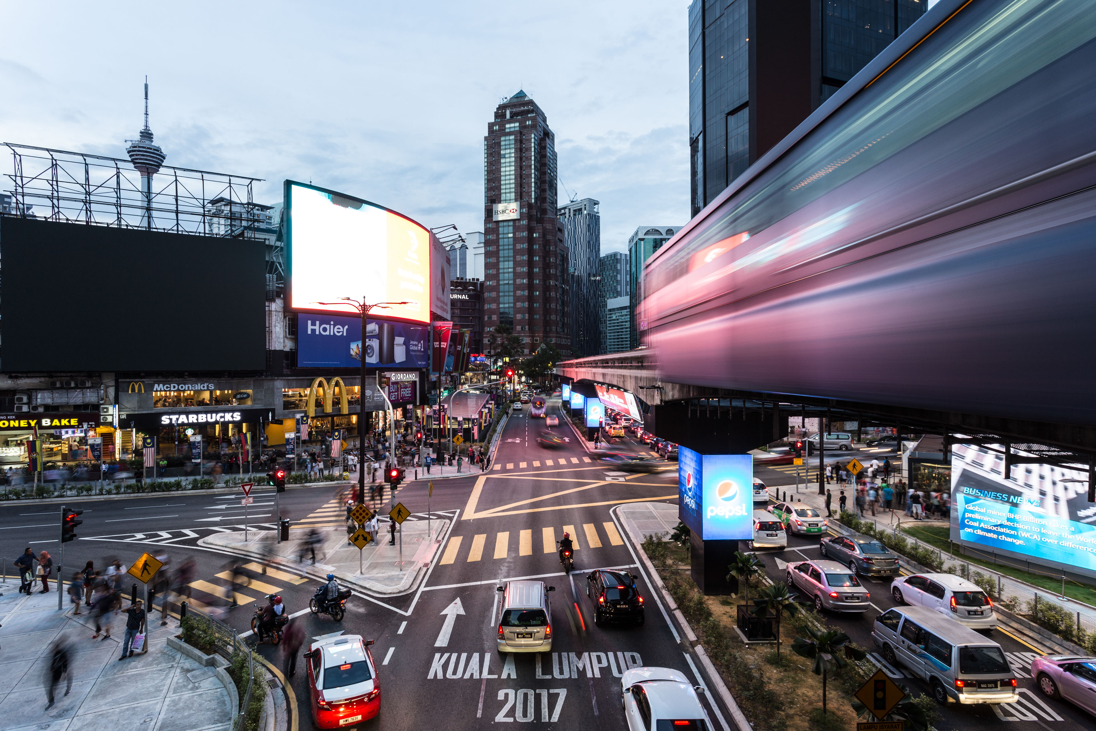 Traffic and monorail car rush