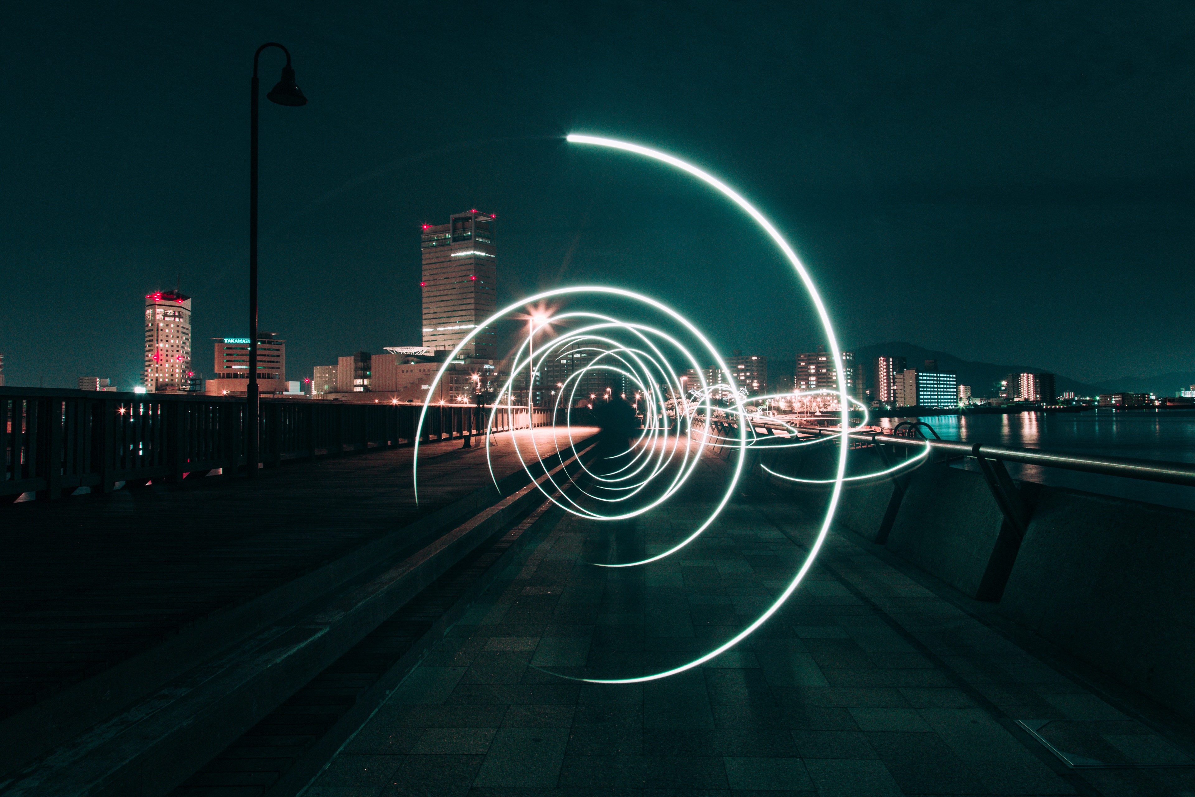 light trails at night on bridge
