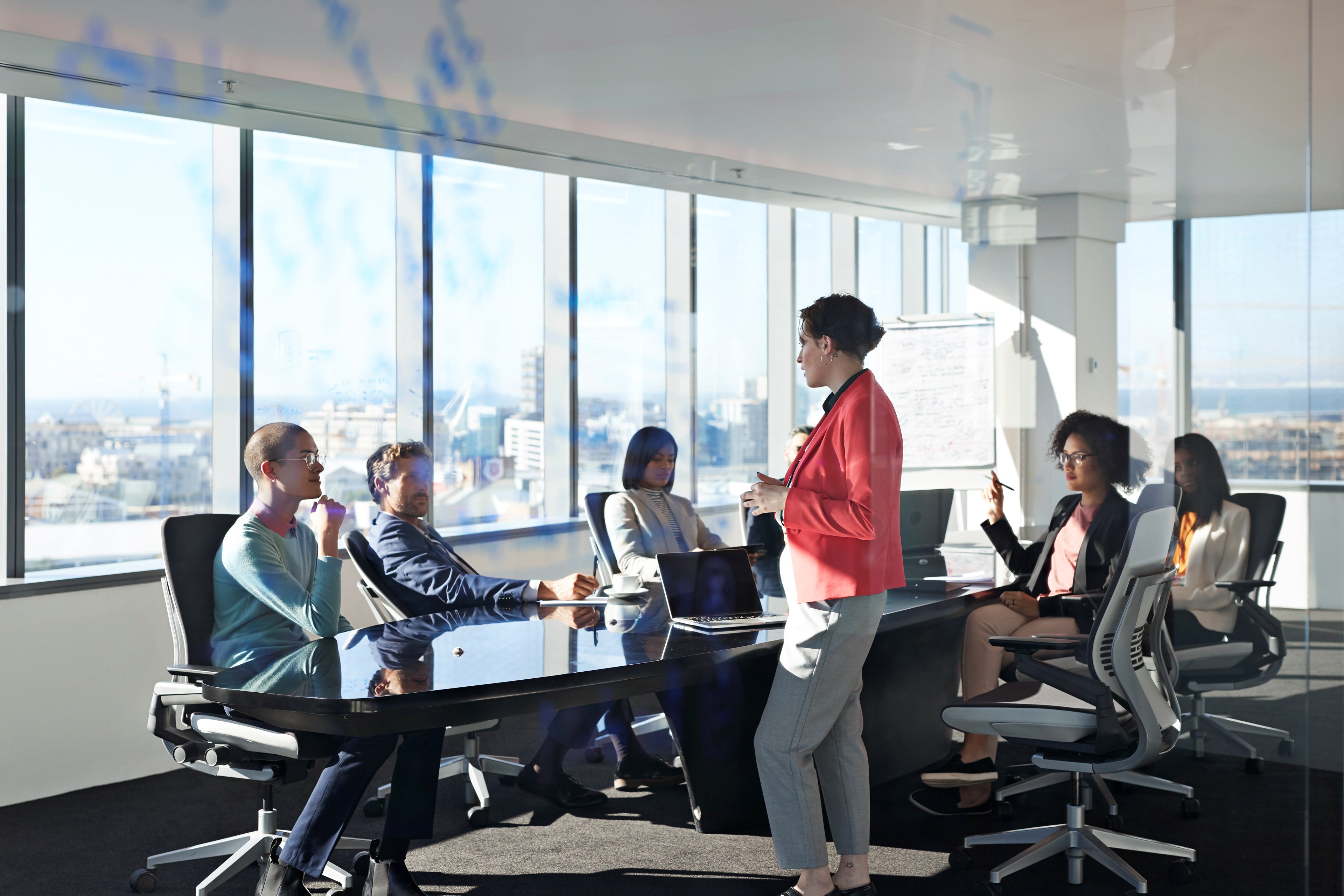 EY strategy session unfolding in light‑filled conference room