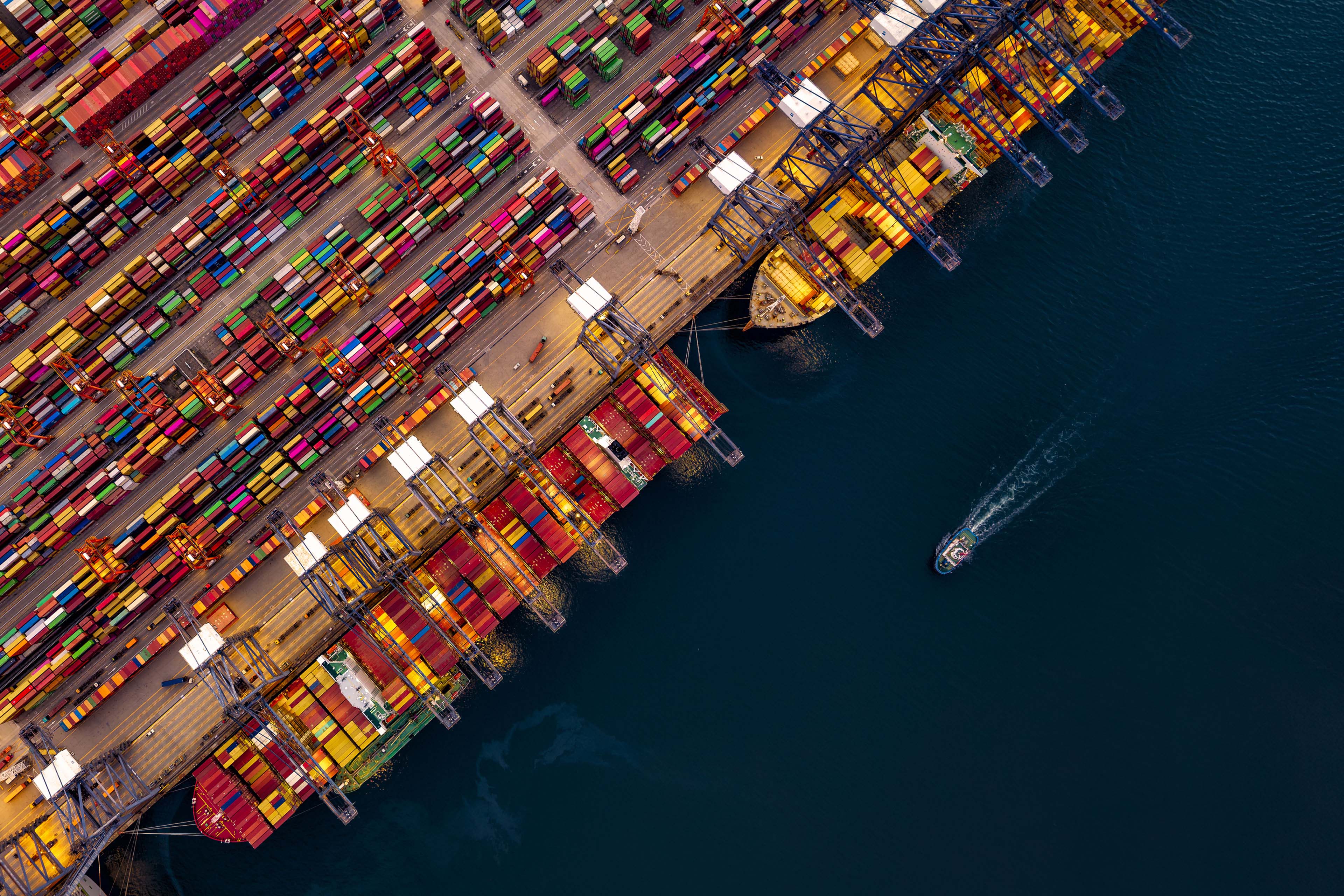 Aerial top view container ships in export and import global business and logistic.