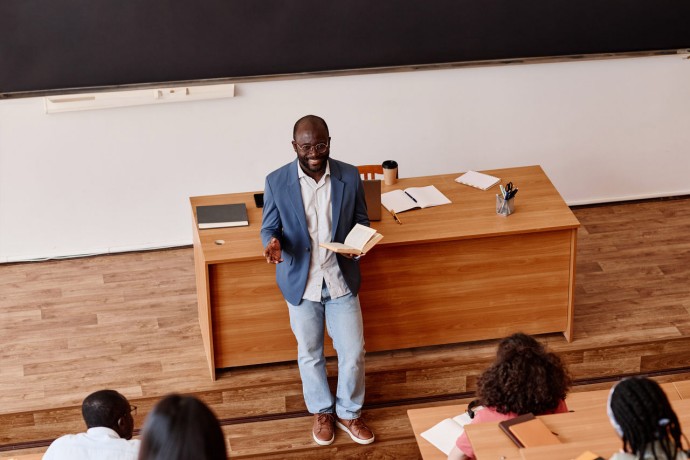 Teacher telling lecture to students at university